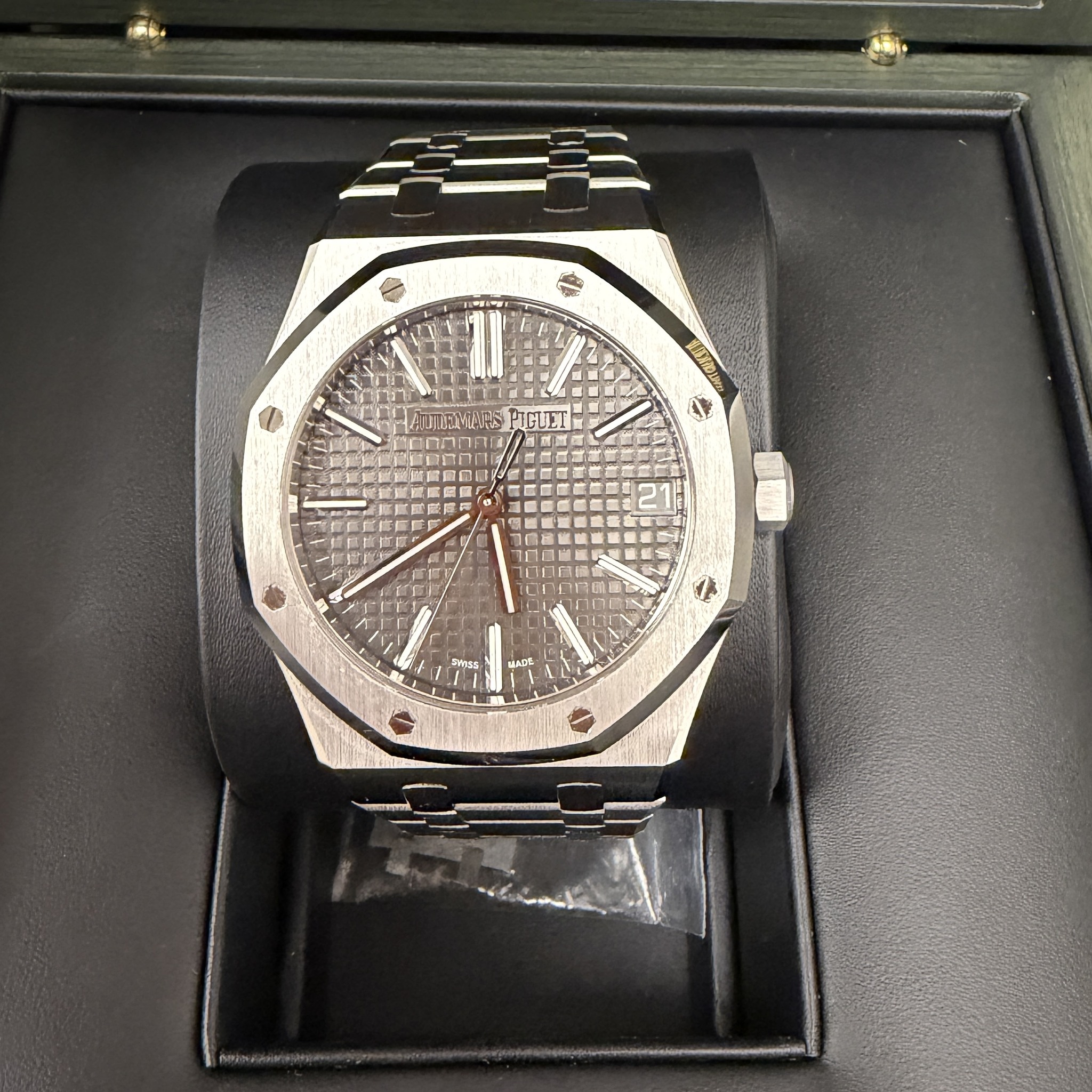 May be an image of wrist watch and text