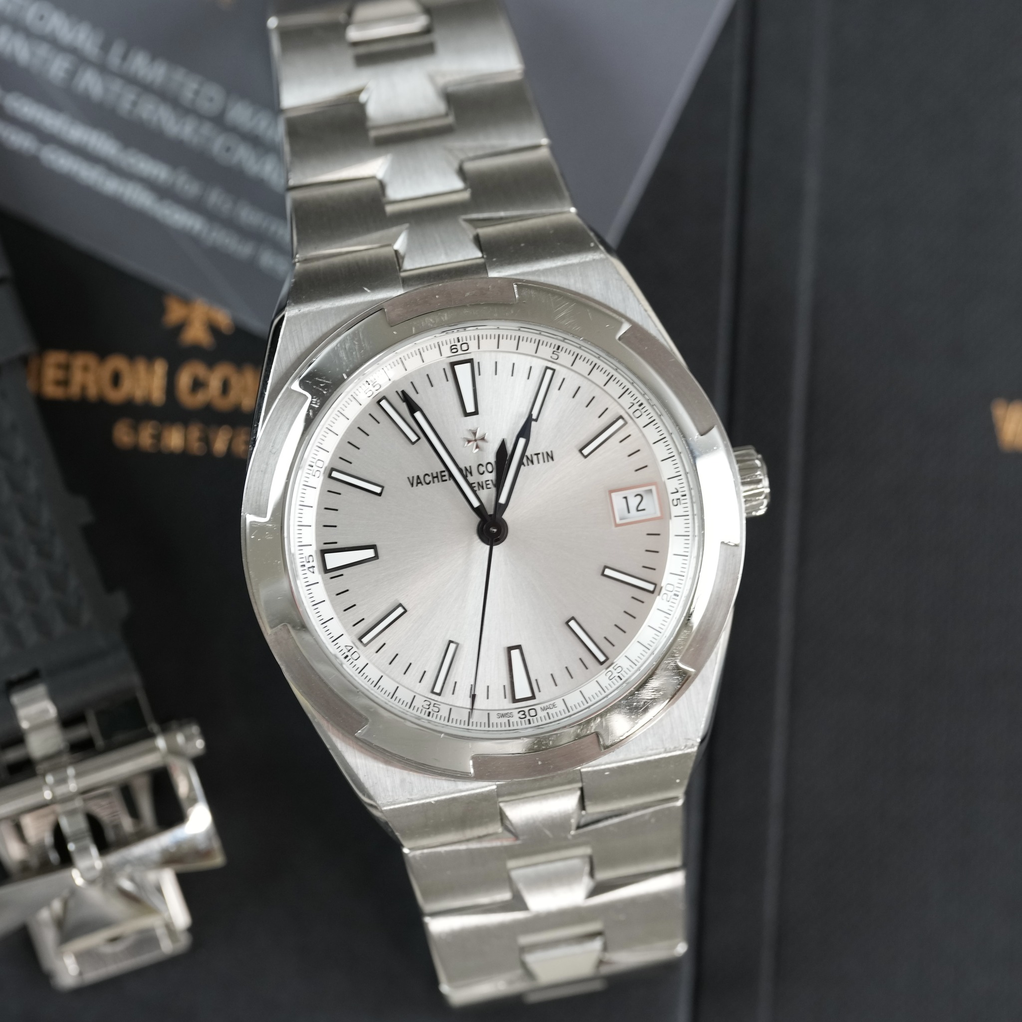 May be an image of wrist watch and text that says 'GRA Bak HC IN 'I' حل VACHE NTIN NCO CO NE 12 451 D. ይማ S'