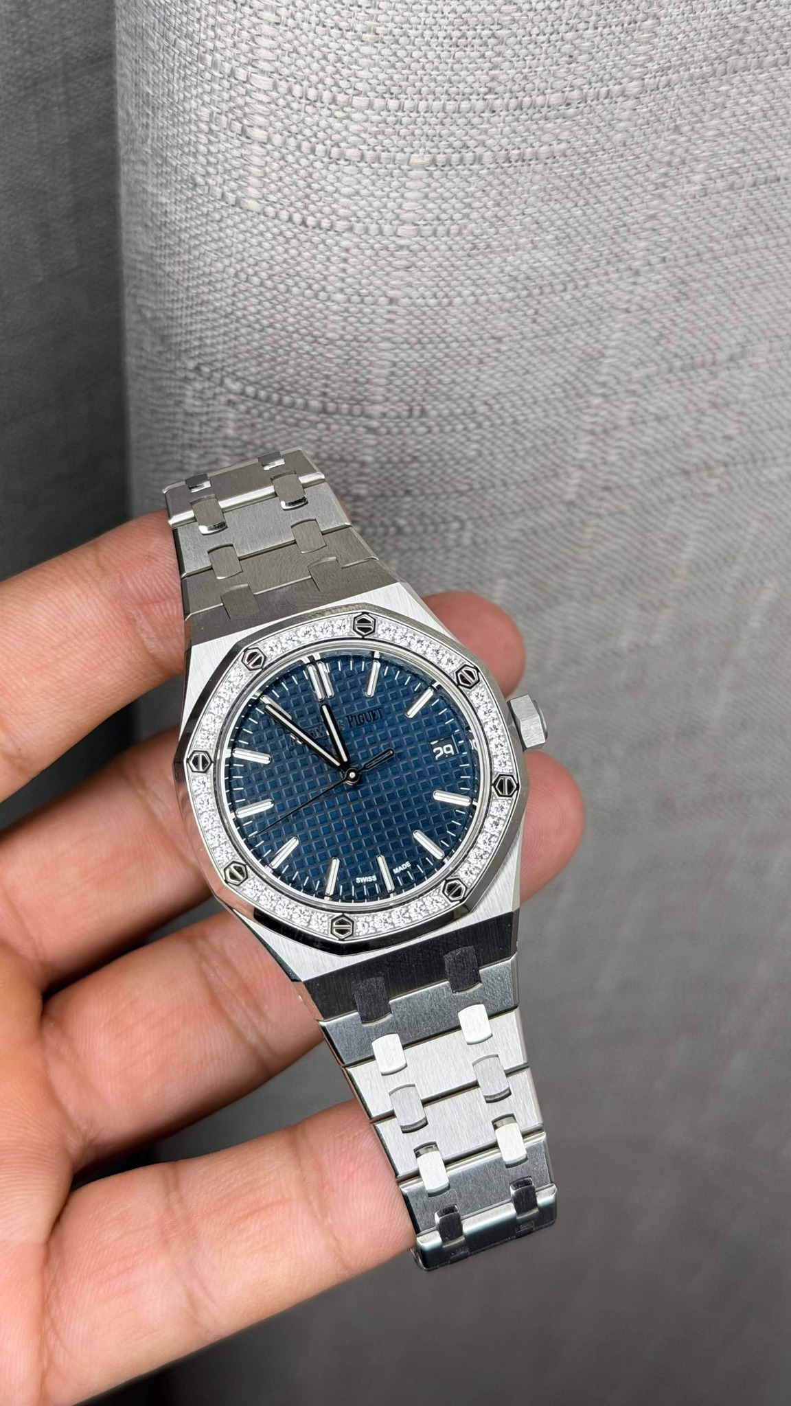 May be an image of wrist watch and text