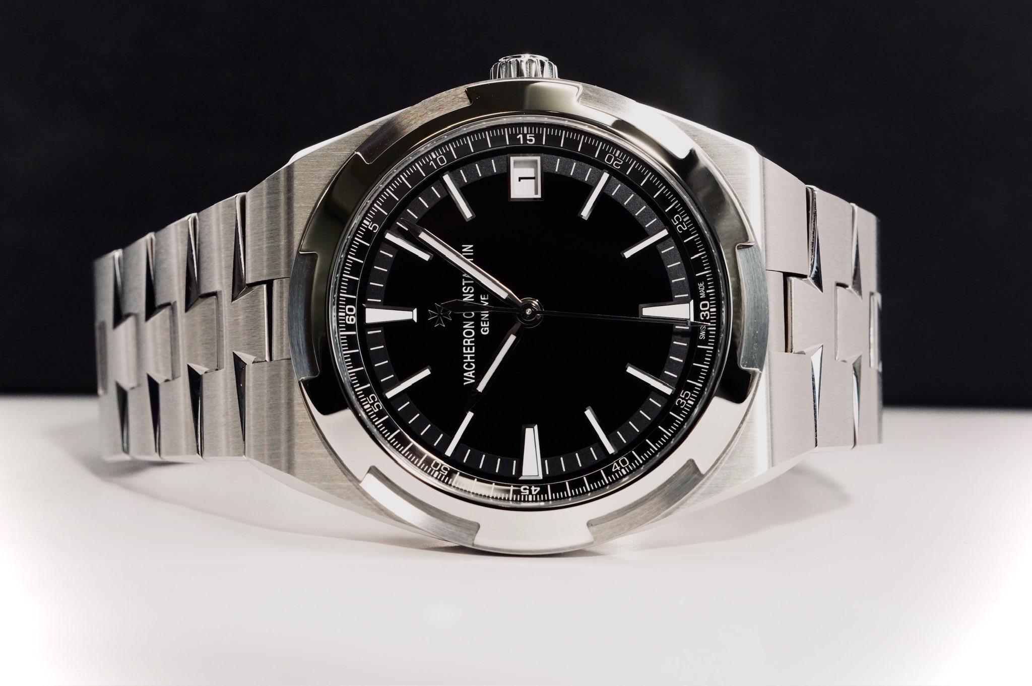 May be an image of wrist watch and text