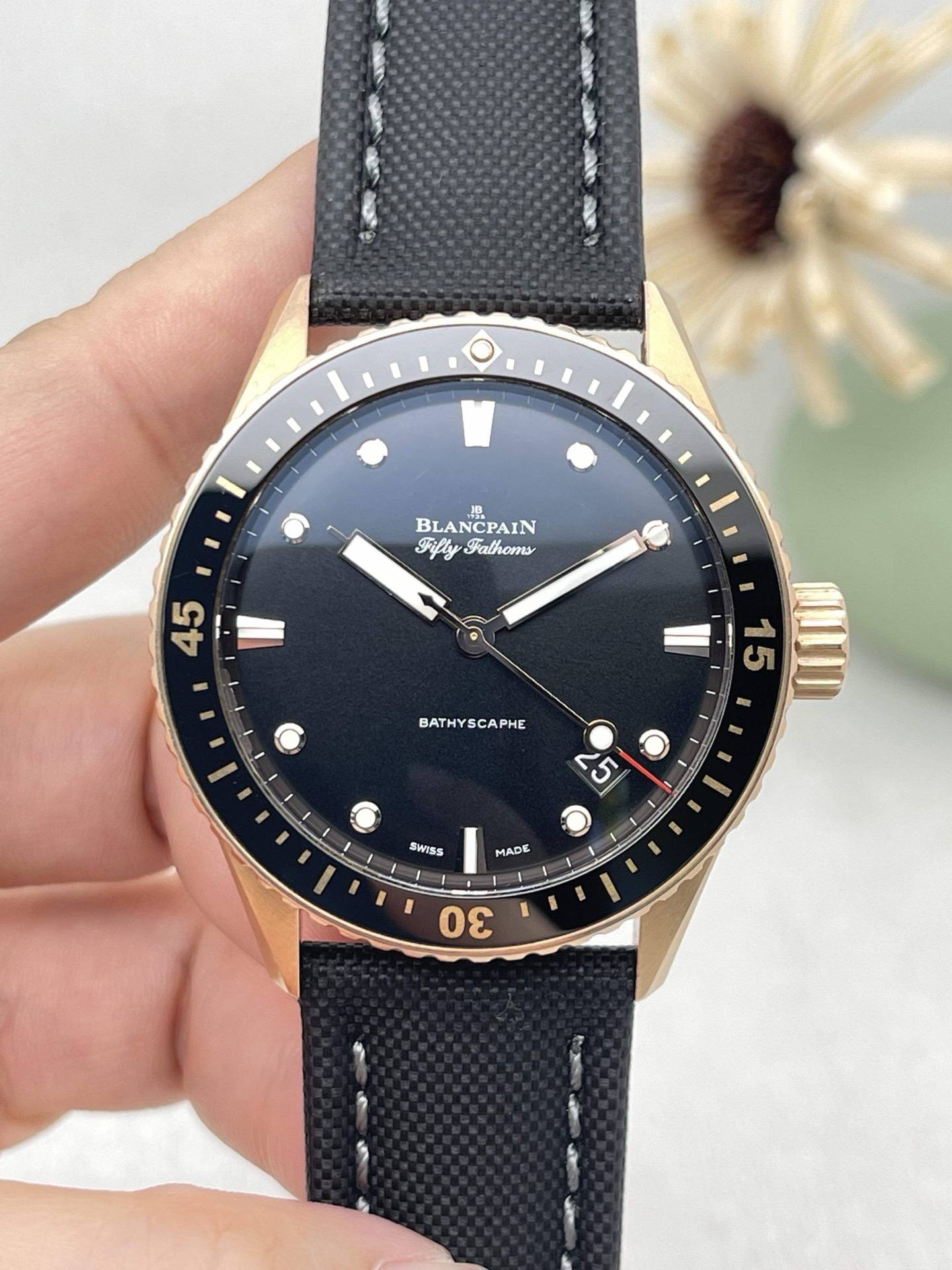 May be an image of wrist watch and text that says 'BLA BLANCPAIN y Falhoms 45 - BATHY BATHYSCAPHE I 25 5 5 o SWISS Sk MADE 30'