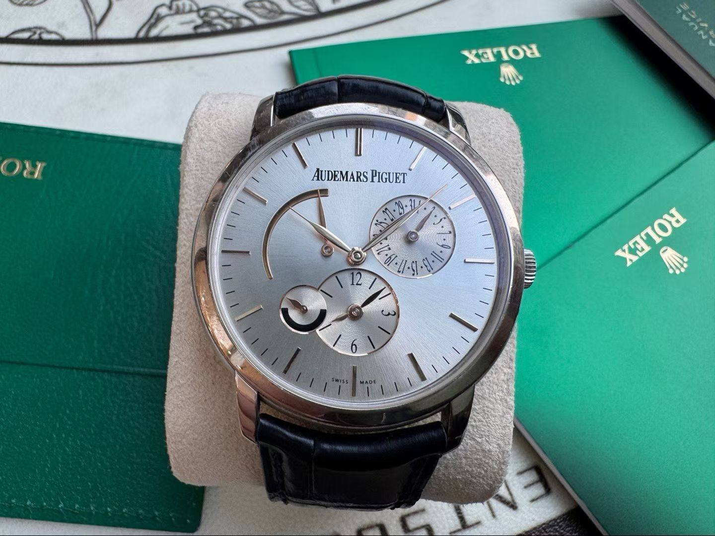 May be an image of wrist watch and text