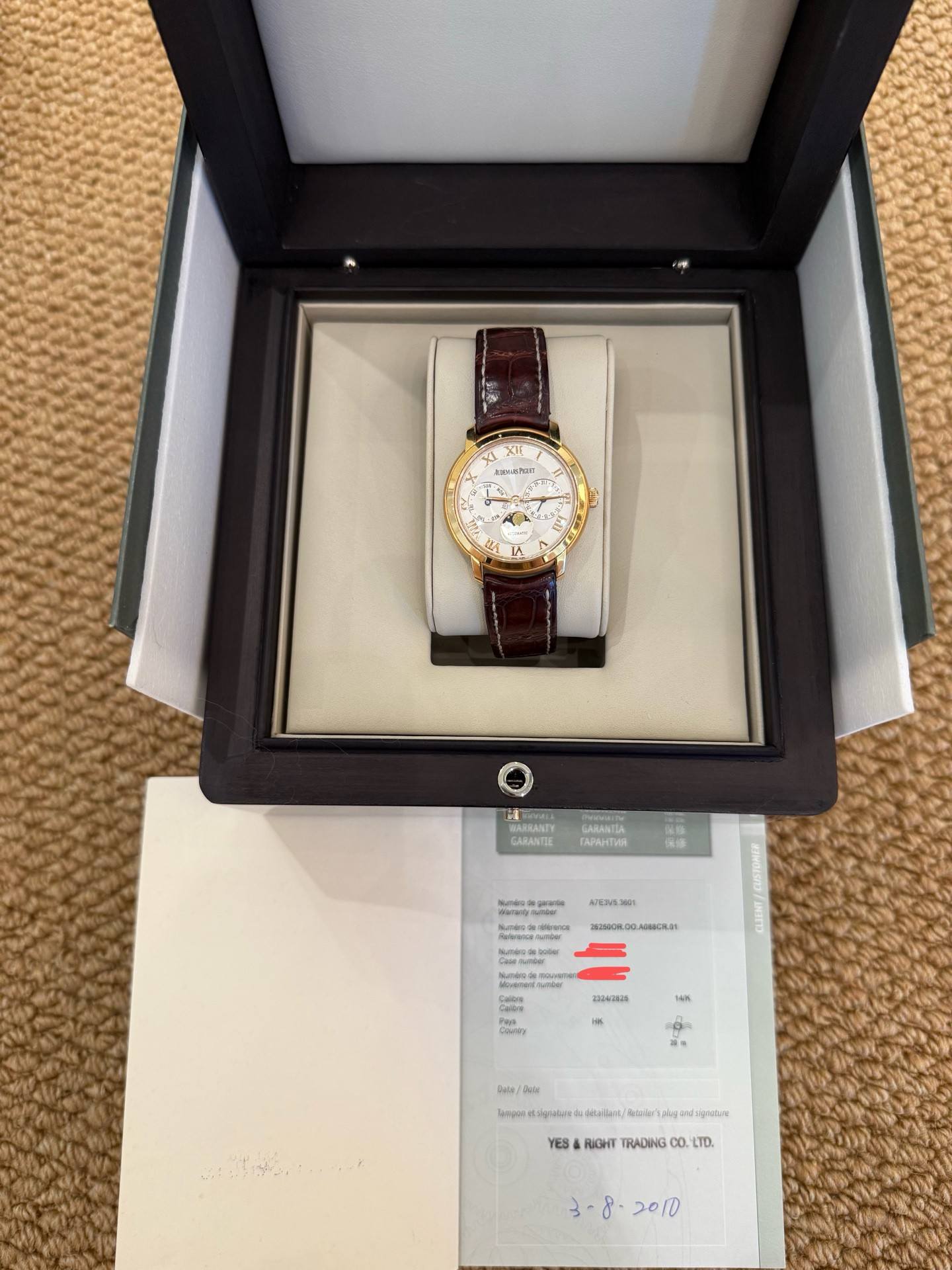May be an image of wrist watch and text