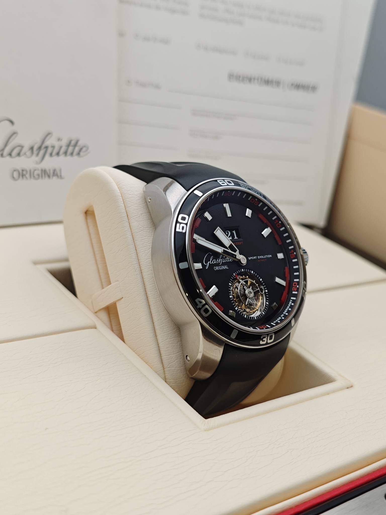 May be an image of wrist watch and text