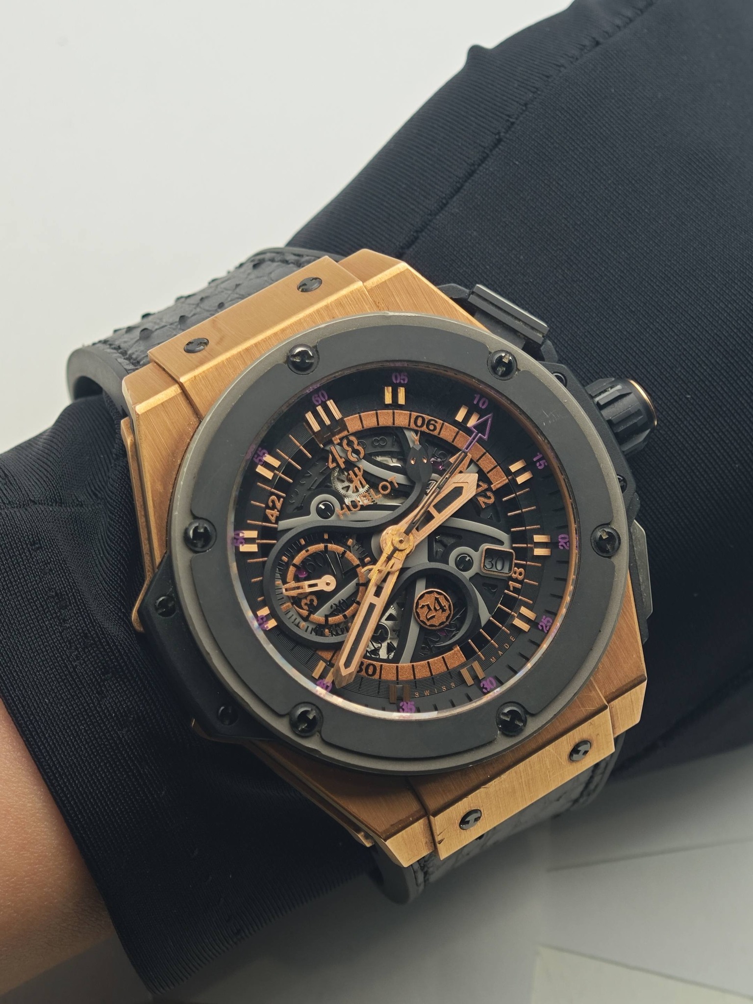 May be an image of wrist watch and text that says 'III 06 T II I'
