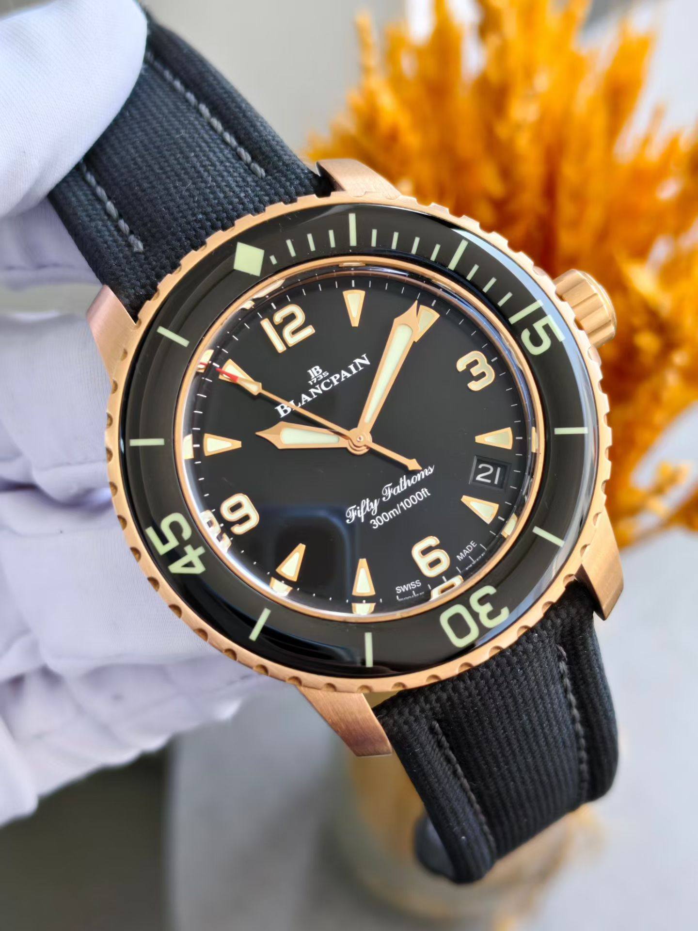 May be an image of wrist watch and text