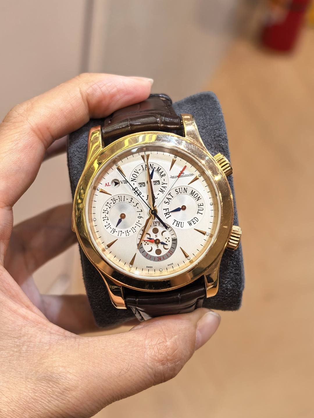 May be an image of wrist watch and text
