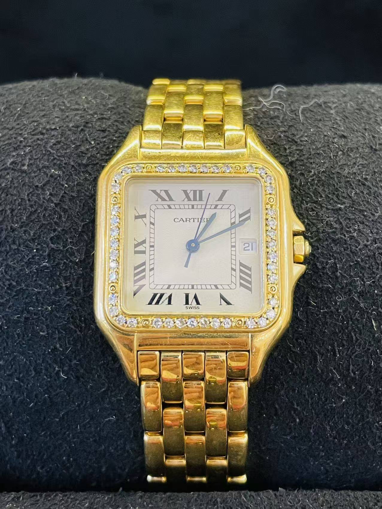May be an image of wrist watch and text
