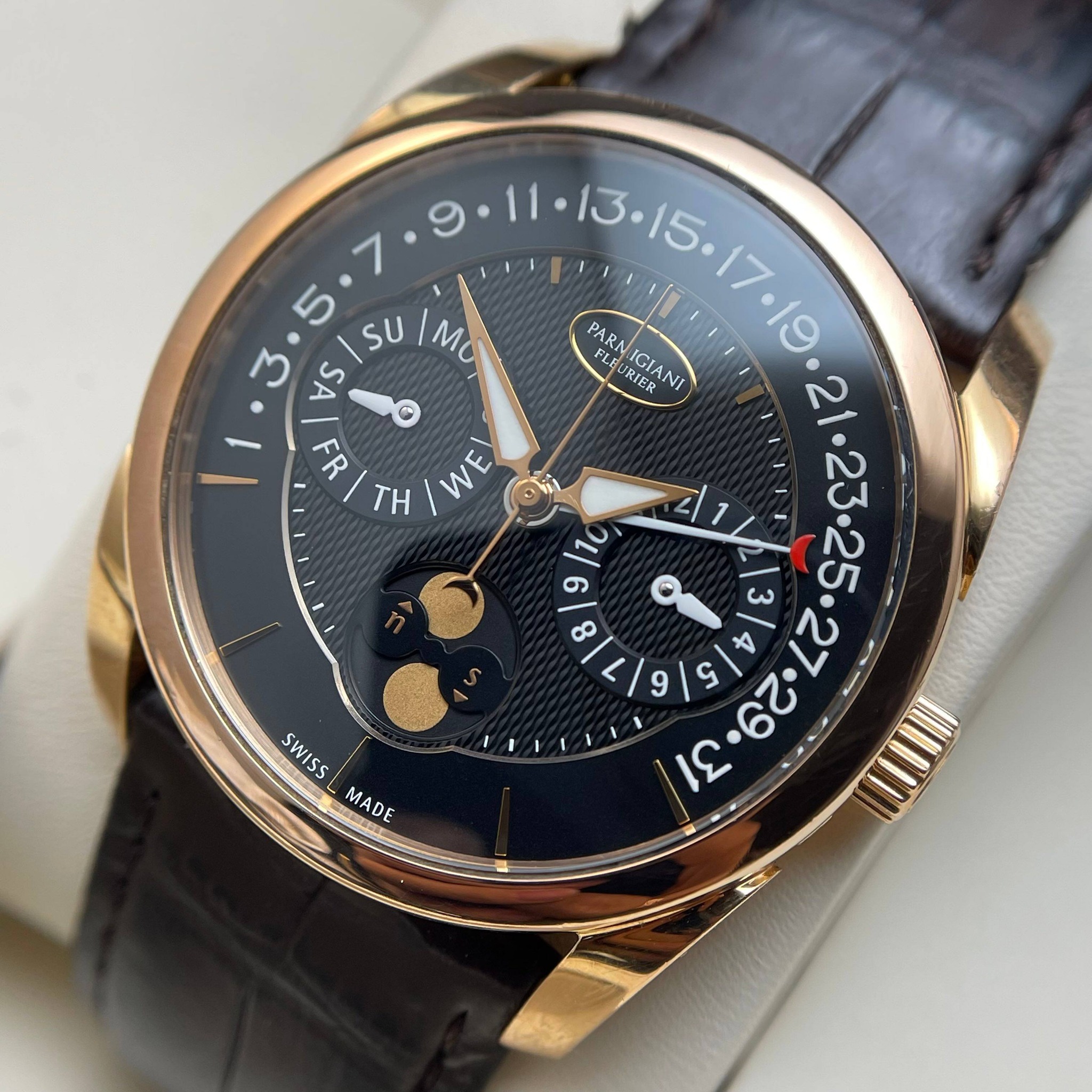 May be an image of wrist watch and text that says '7 5 SU MC 3 AS © TH ٢ VE لن PARA FLE RIER UGIANI IGIANI 2l FLE URIER ስርል 10 6 O 9 9 o c SWISS MADE'