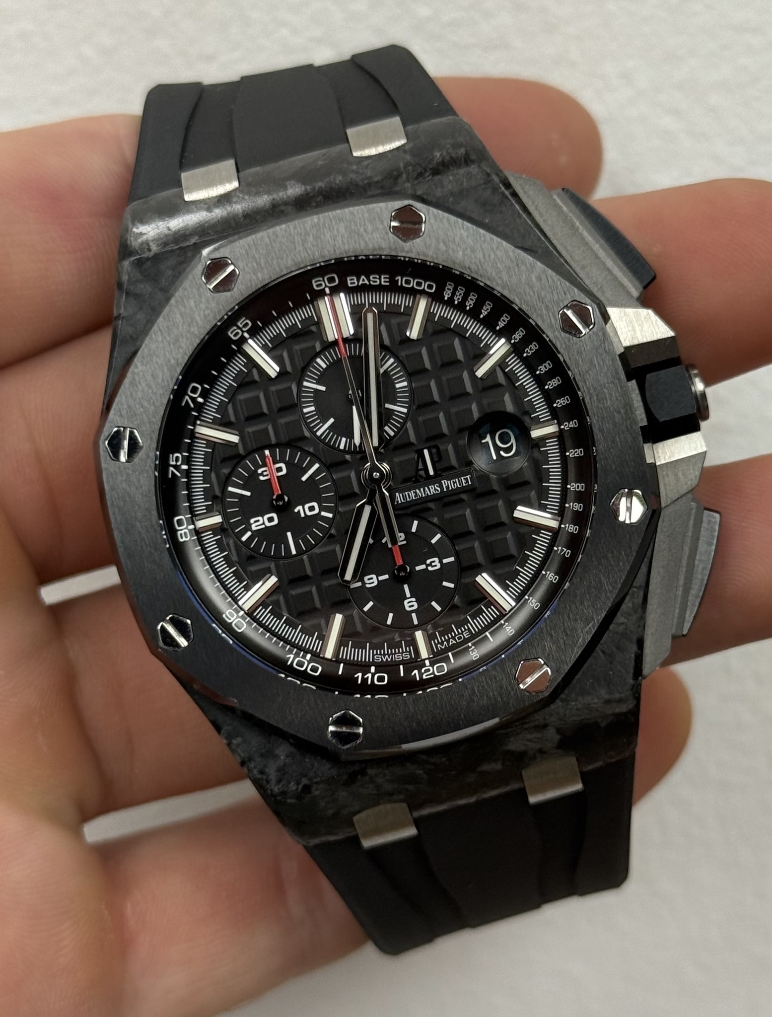 May be an image of wrist watch and text