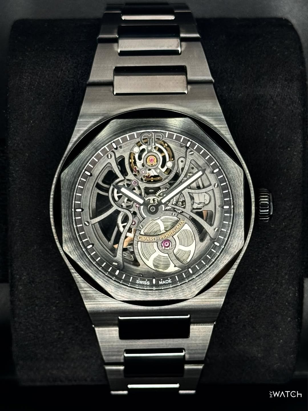 May be an image of wrist watch and text