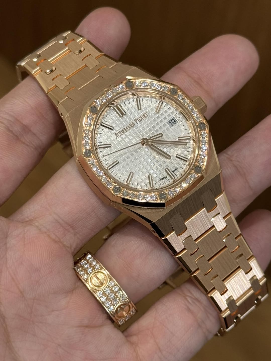 May be an image of wrist watch and text