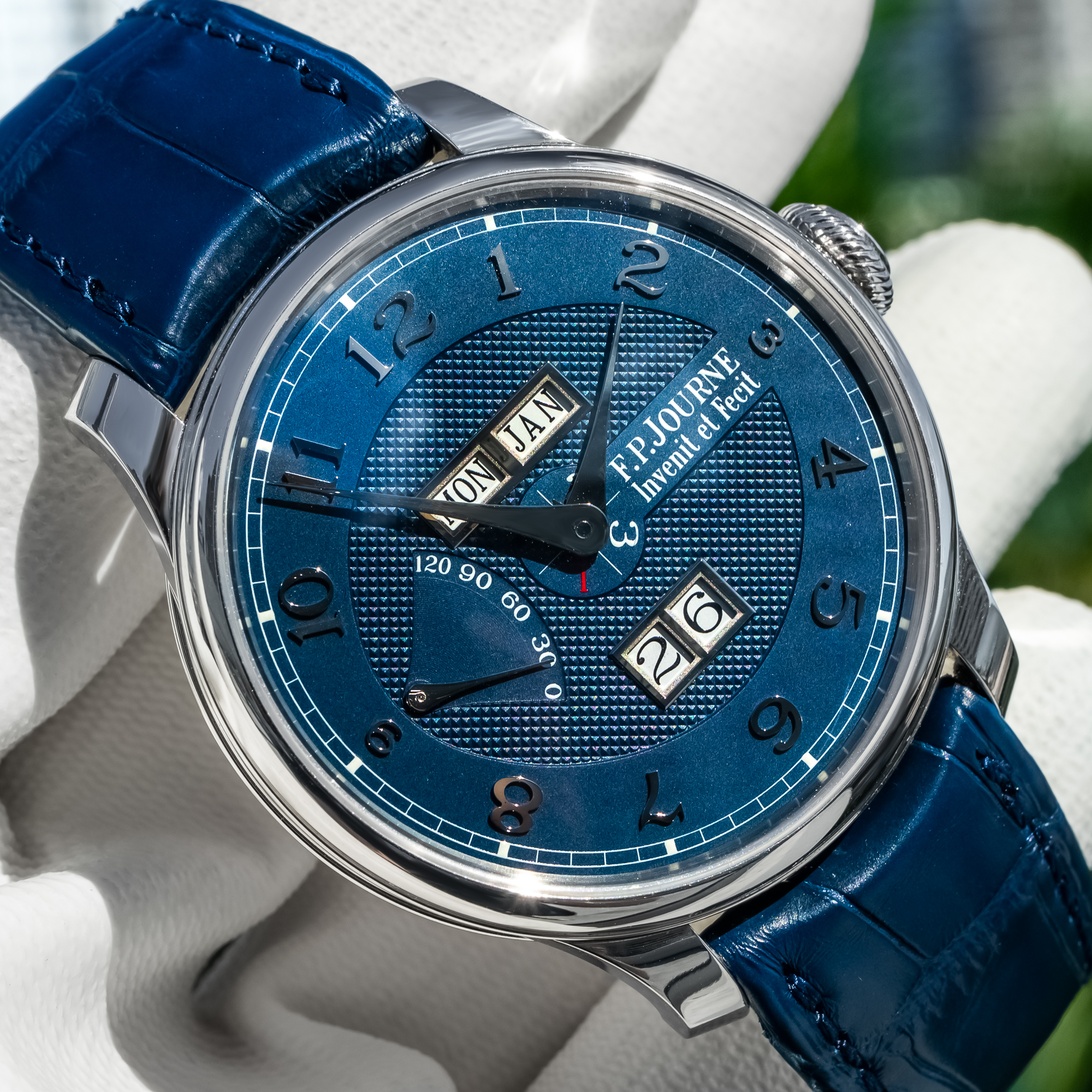 May be an image of wrist watch and text