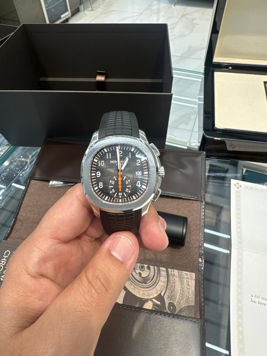 May be an image of wrist watch and text