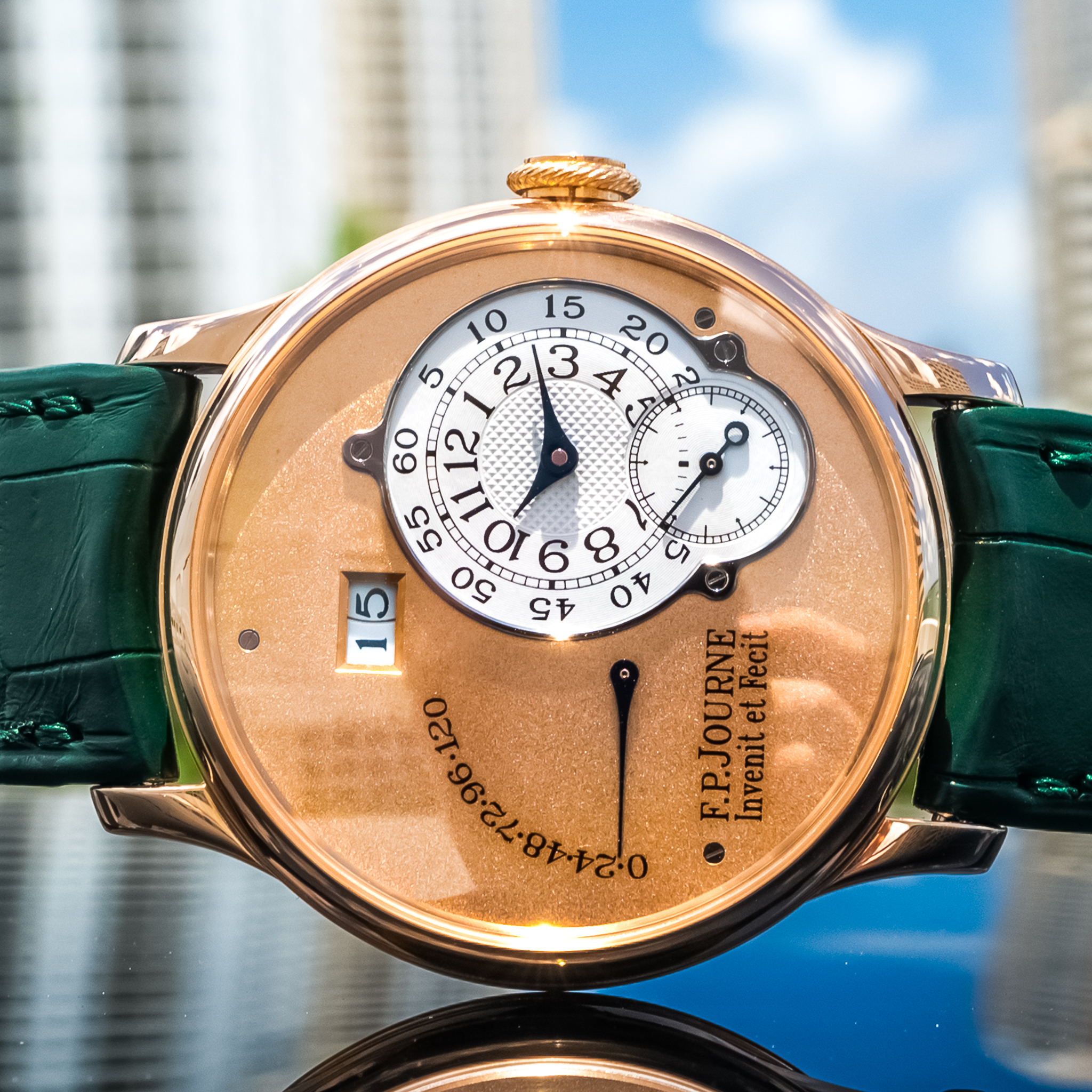 May be an image of wrist watch and text that says '10 Ο 15 20 5 II 2 3 4 م ID0 ΕΚp O 대그당 60 12 55 CLl 11 to 50 6 8 CCD 达 F.P.JOURNE InvenitetFecit Invenit etFecit'