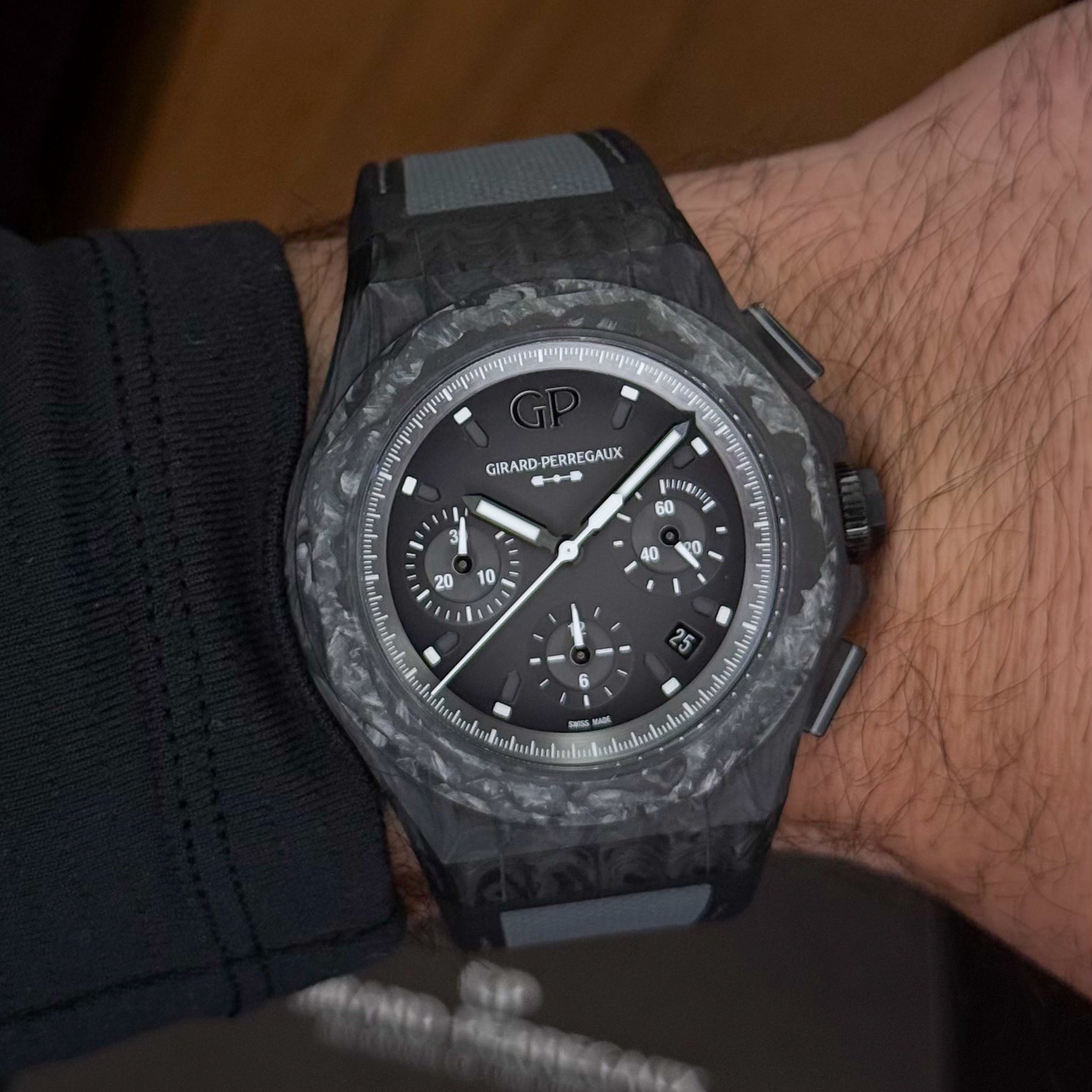 May be an image of wrist watch and text that says 'GIRAR GIRARD-PERREGAUX RD PERREGAUX 3 60 ህ 日 E 5 S - 25 6 អណេស M e'