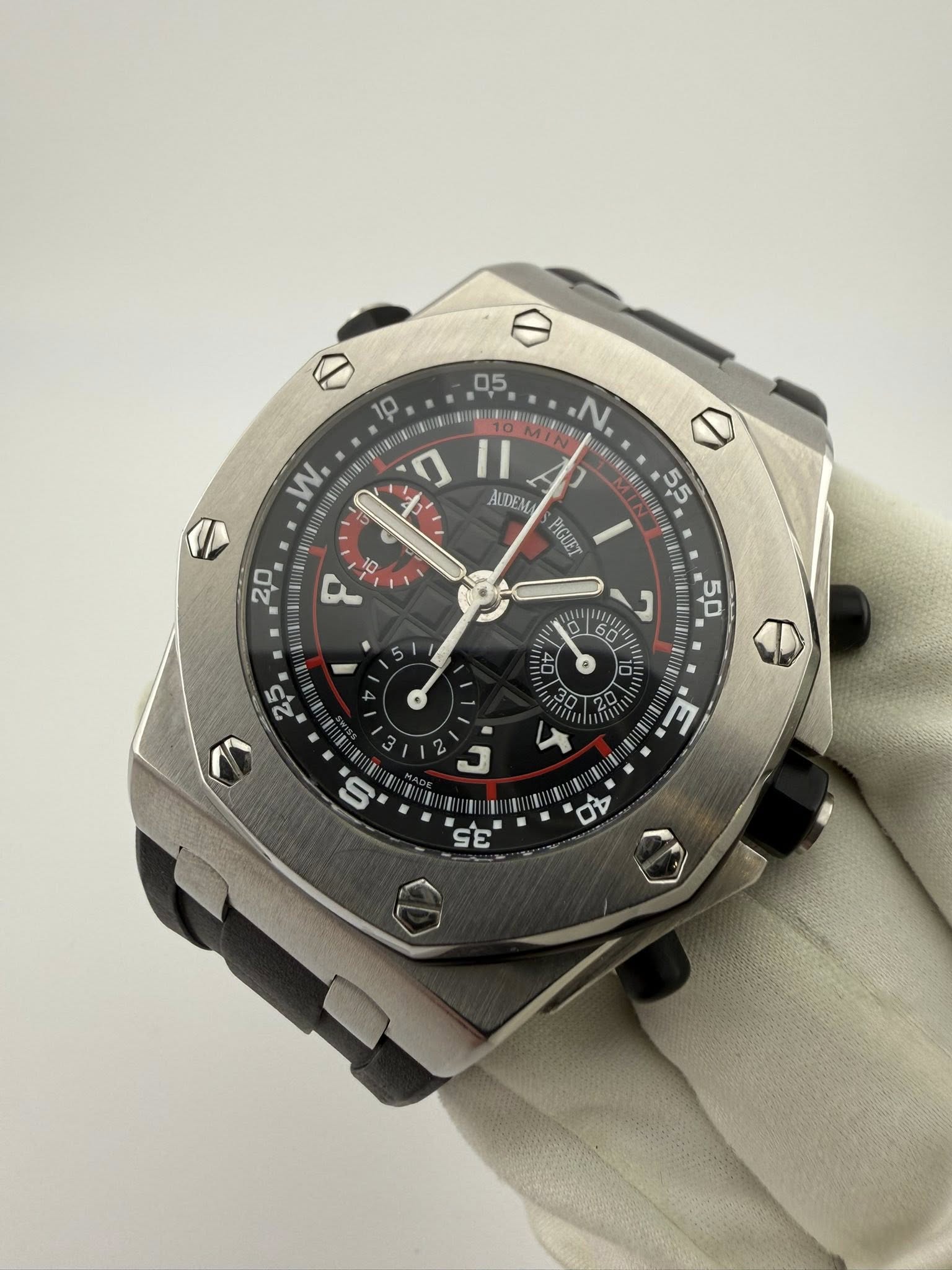 May be an image of wrist watch and text