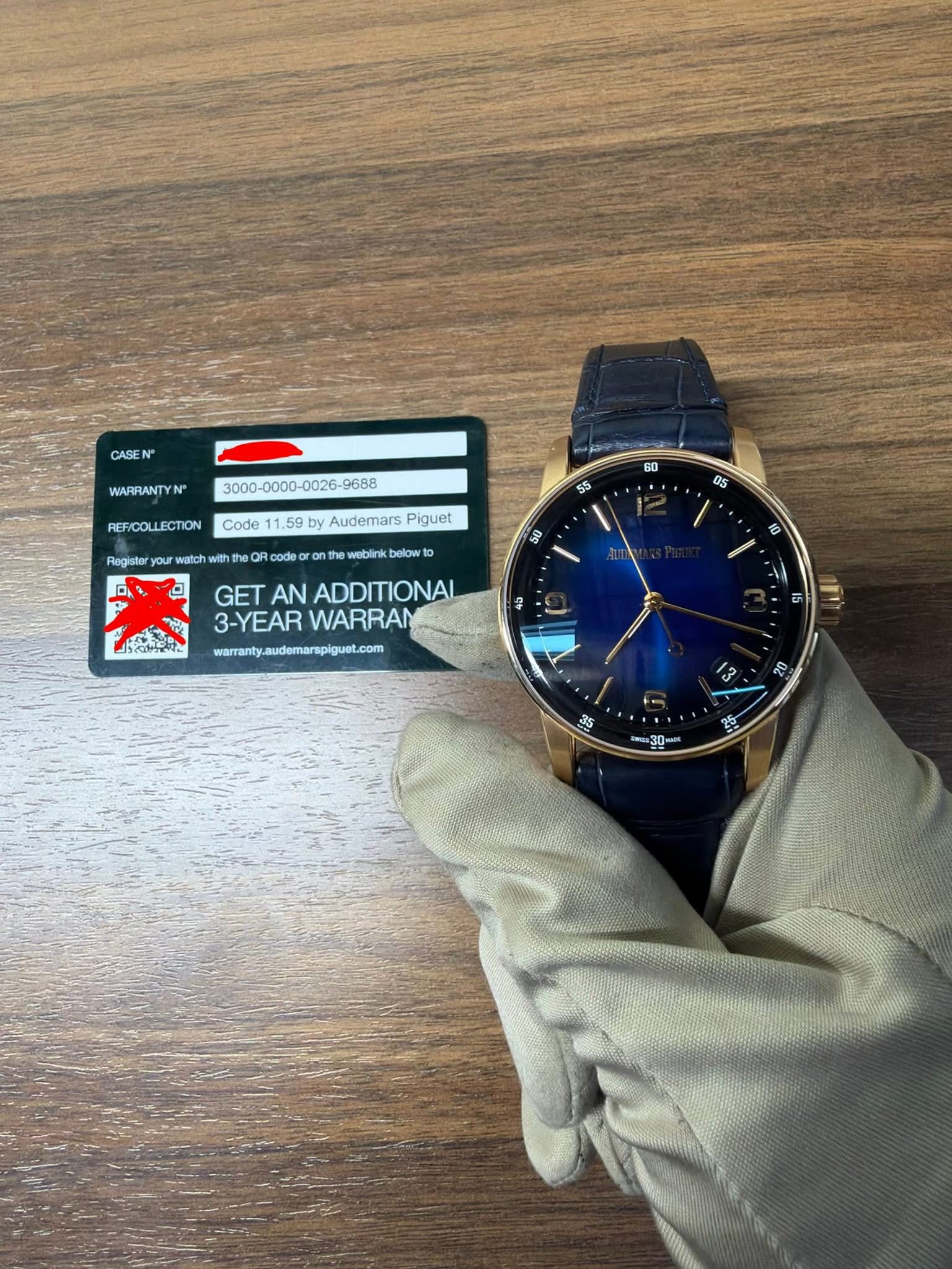 May be an image of digital watch and text that says 'CASE WARRANTYN N" REF/COLLECTION Code Rogister 1.59 59 by Audemars Piguet 50 watch with 的對 せ QR codo 55 0. 05 weblink below 9…