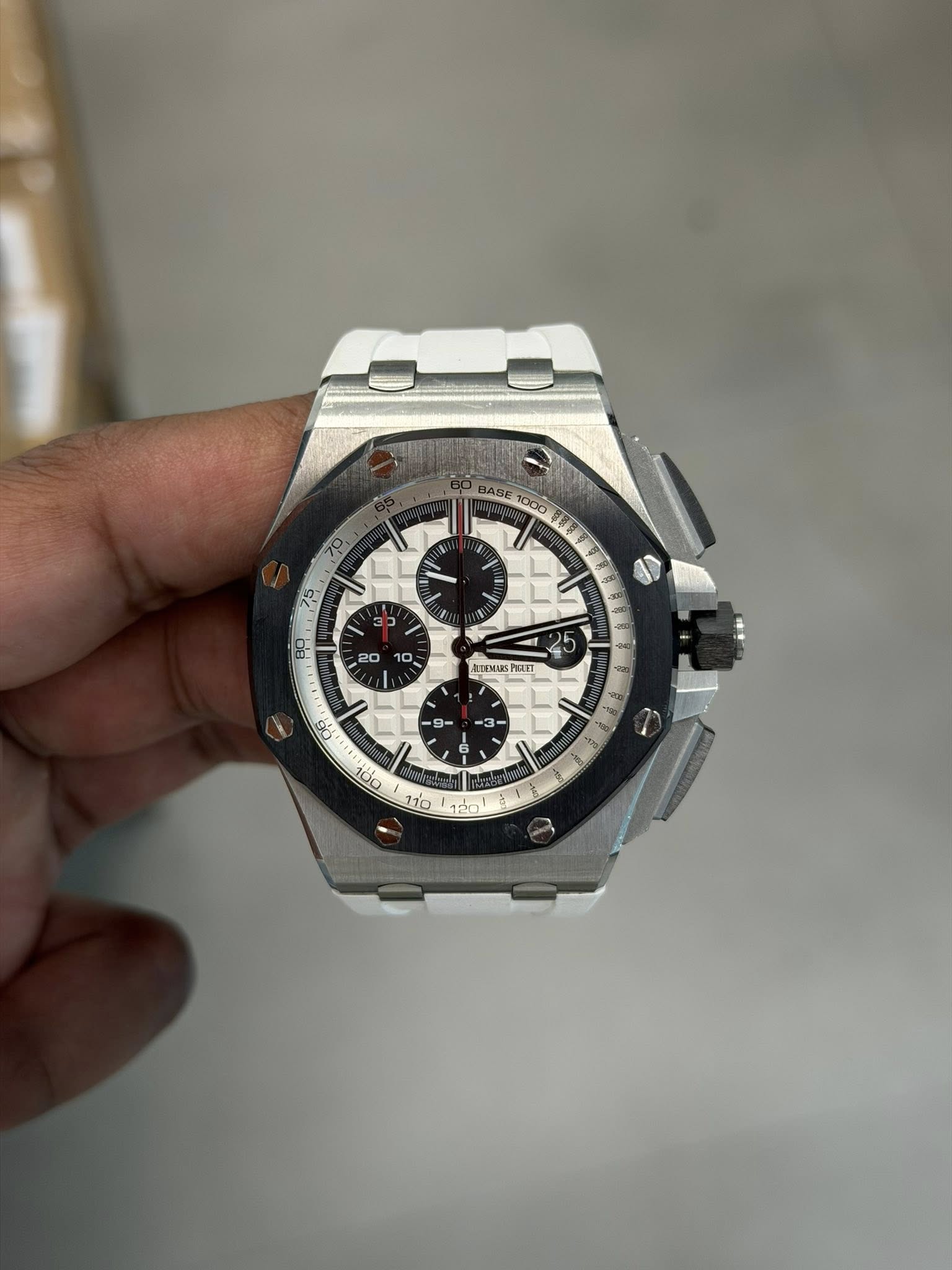 May be an image of wrist watch and text