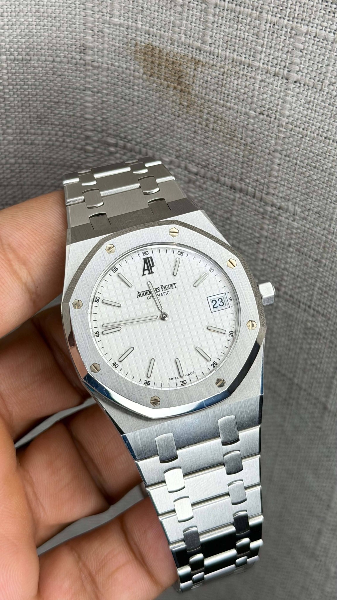 May be an image of digital watch and text