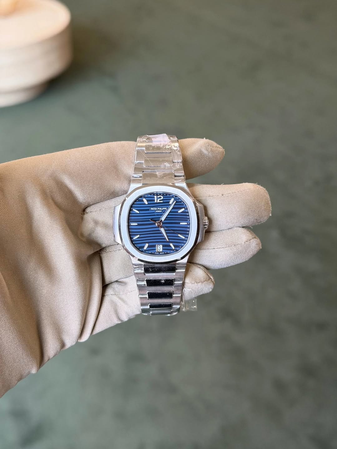 May be an image of wrist watch and text
