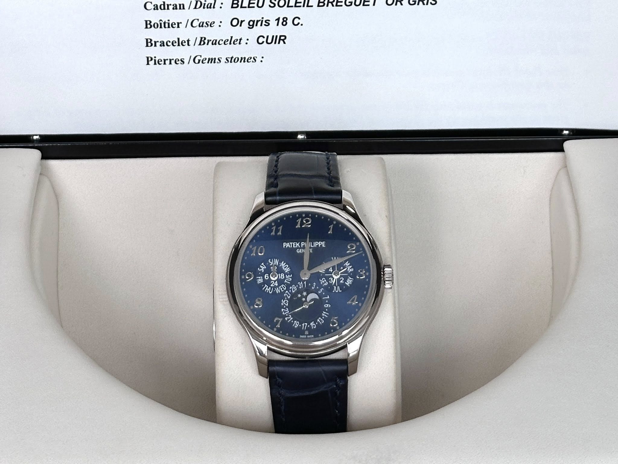 May be an image of wrist watch and text that says 'Cadran Dial: BLEU SOLEIL BREGUET Boîtier /Case: Or gris 18 C. Bracelet Bracelet: CUIR Pierres Gems stones: on আও PATEKP…