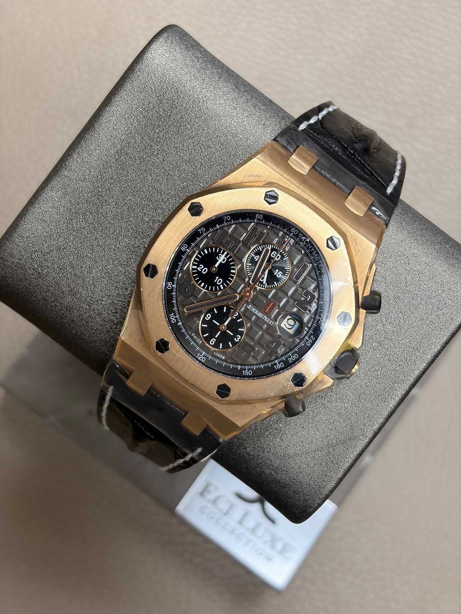 May be an image of wrist watch and text