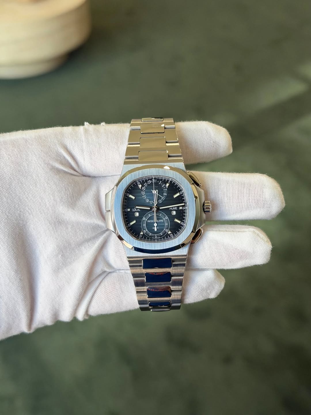 May be an image of wrist watch and text