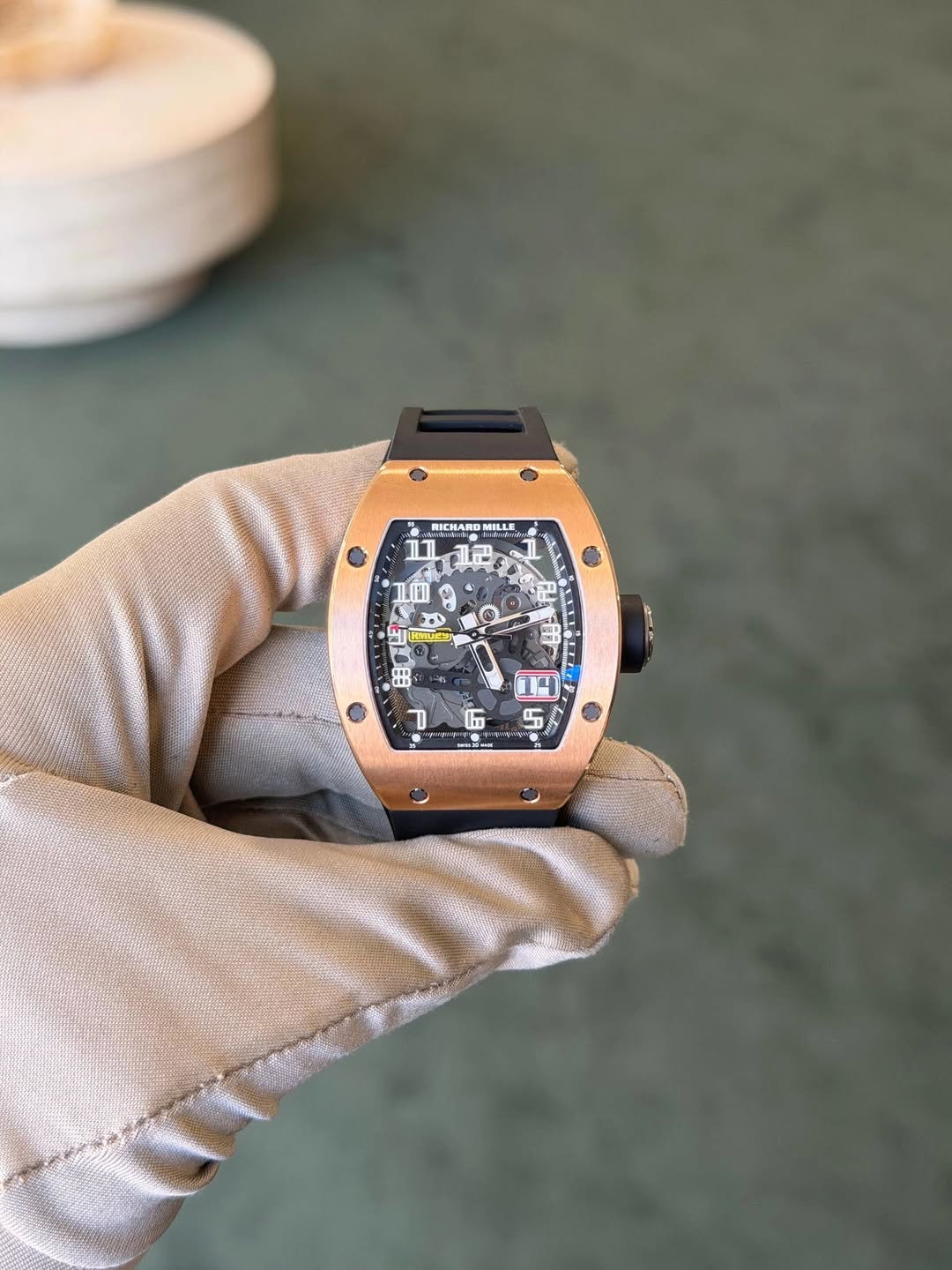 May be an image of wrist watch and text