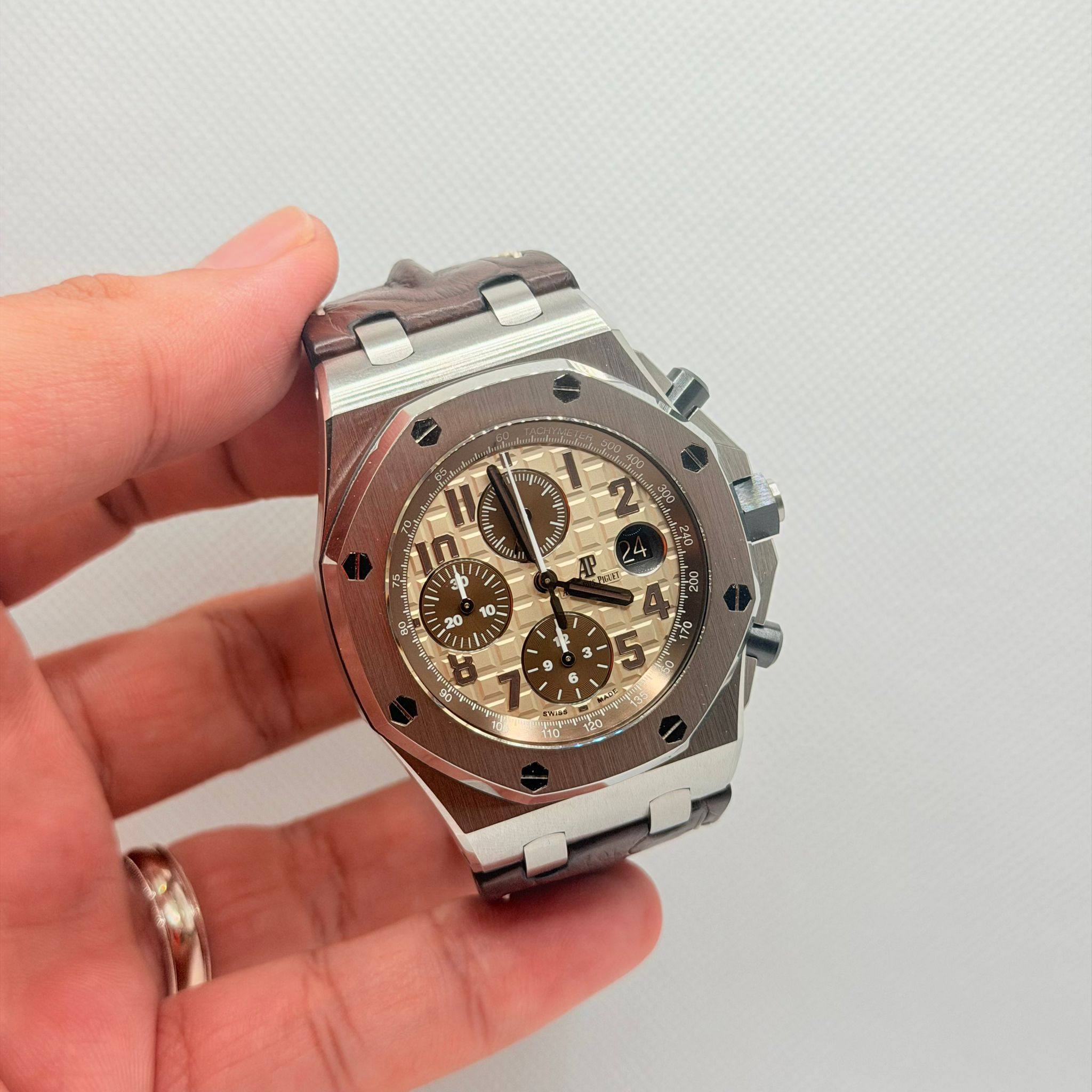 May be an image of wrist watch and text