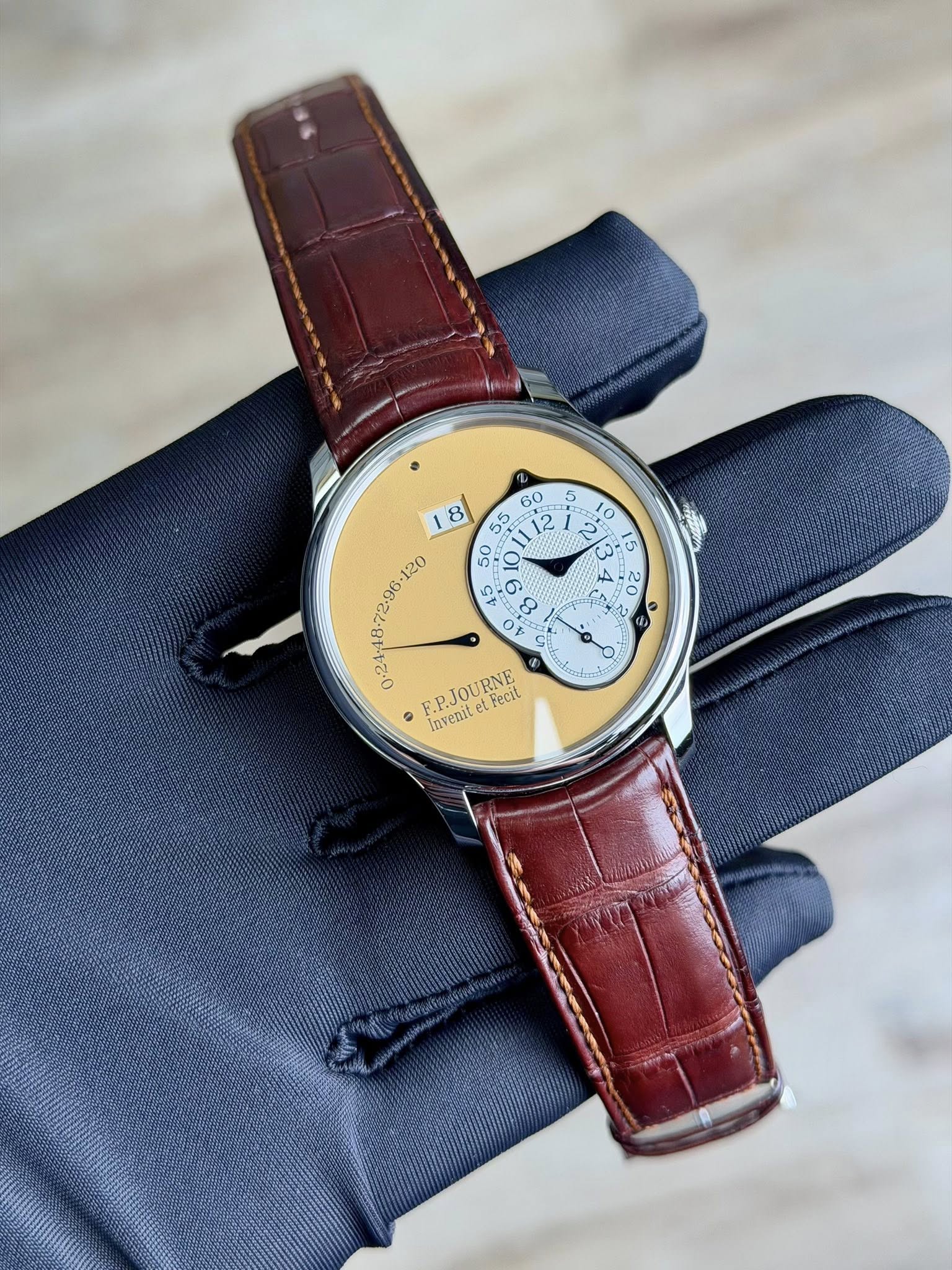May be an image of wrist watch and text