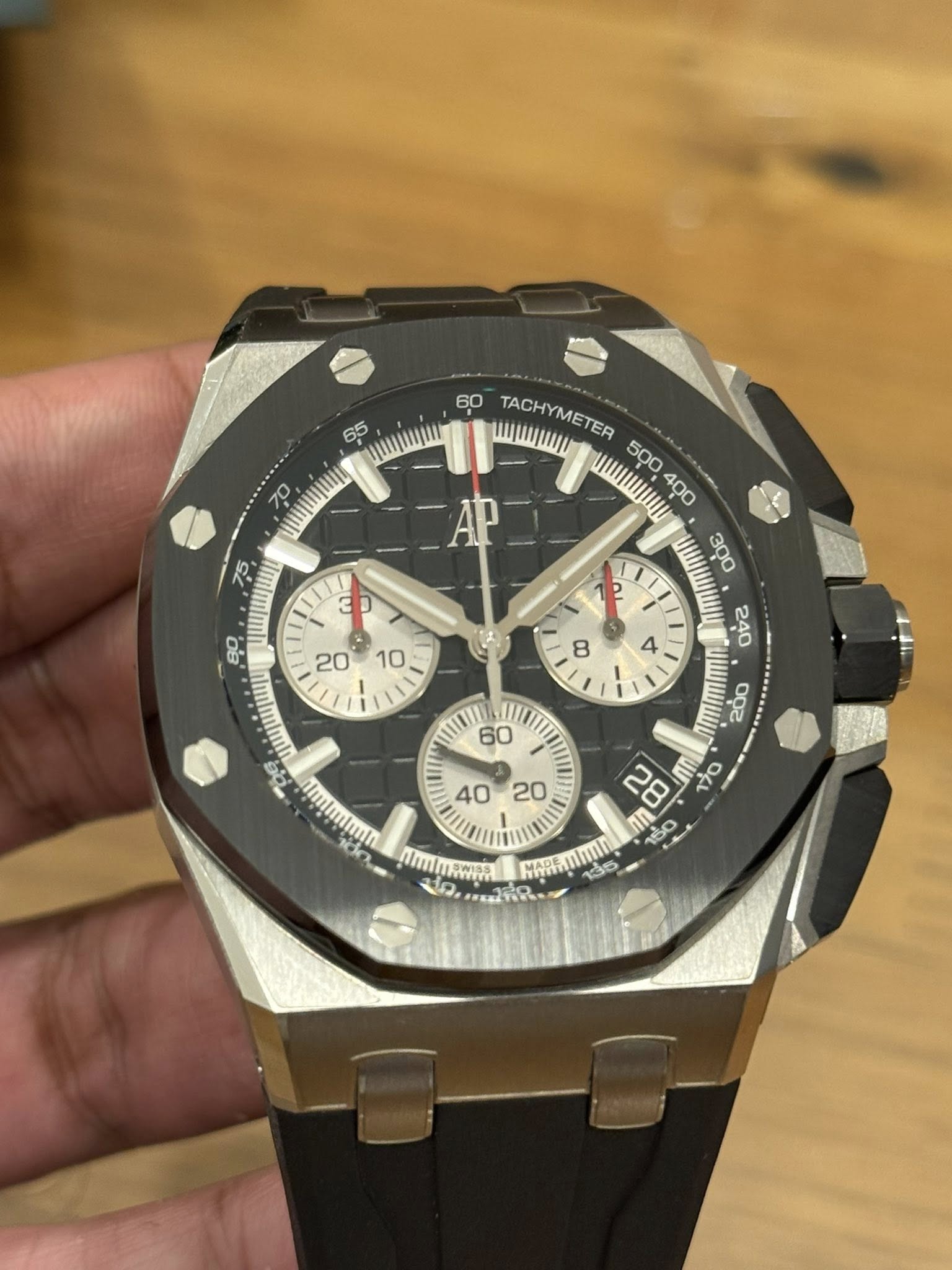 May be an image of wrist watch and text