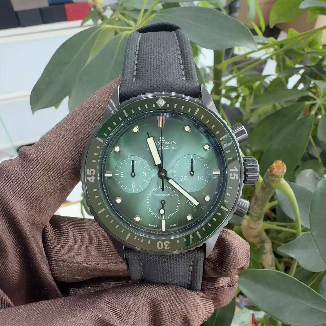 May be an image of wrist watch and text
