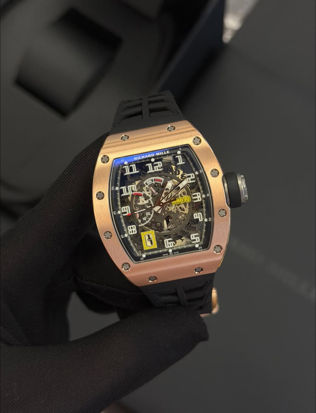 May be an image of wrist watch and text