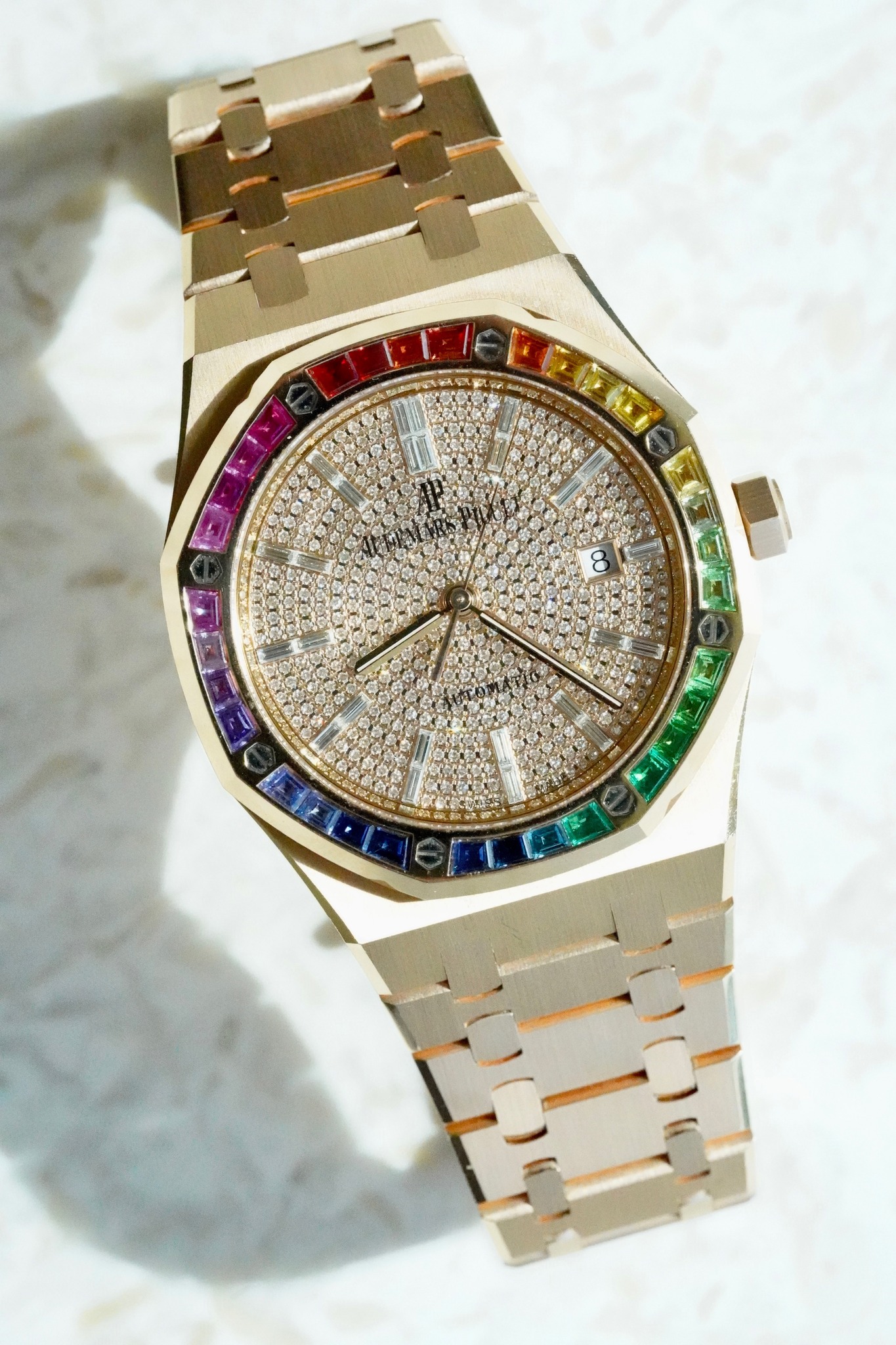 May be an image of wrist watch and text