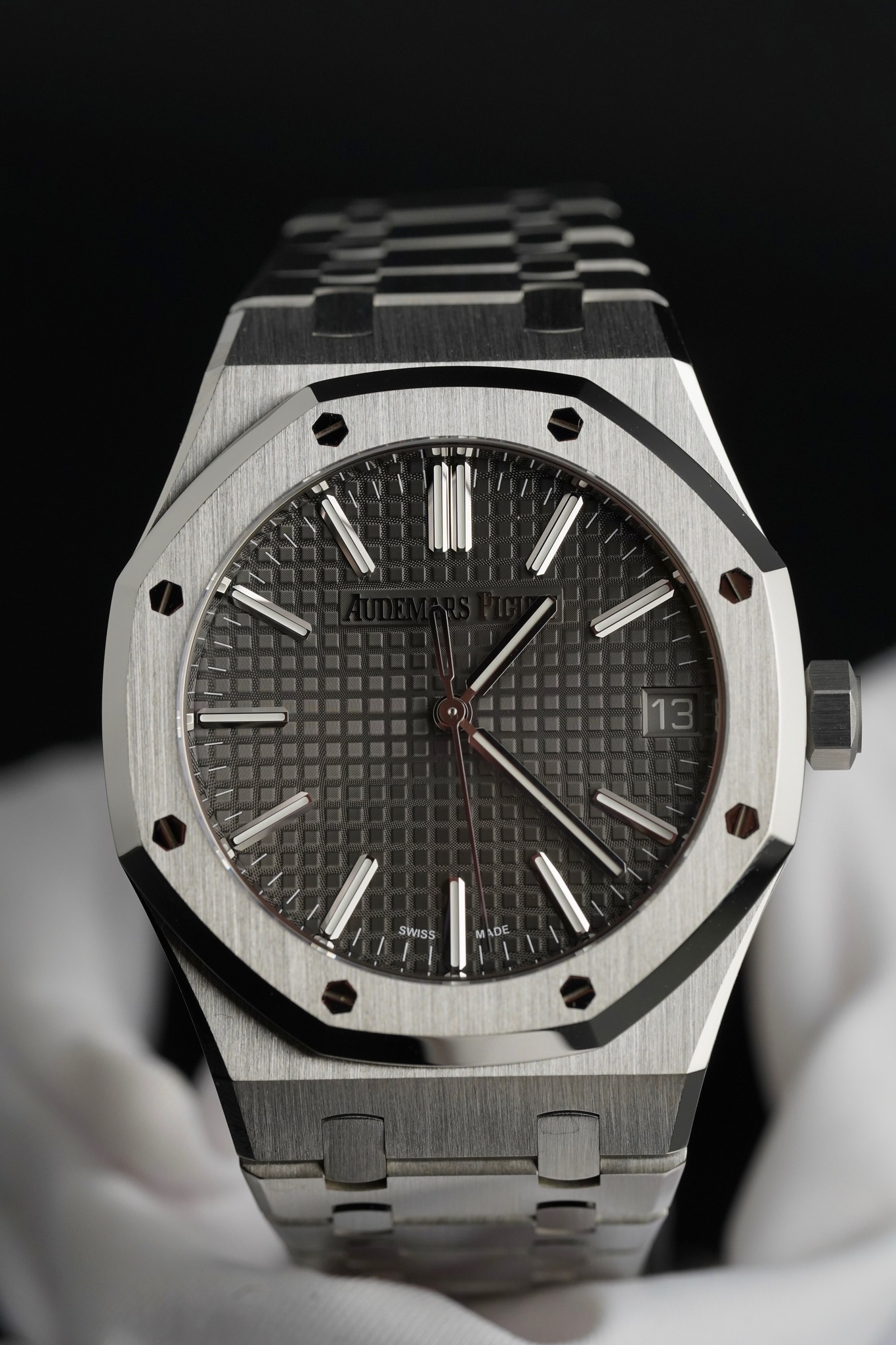 May be an image of wrist watch and text that says '|13 SWISS ADE DE'
