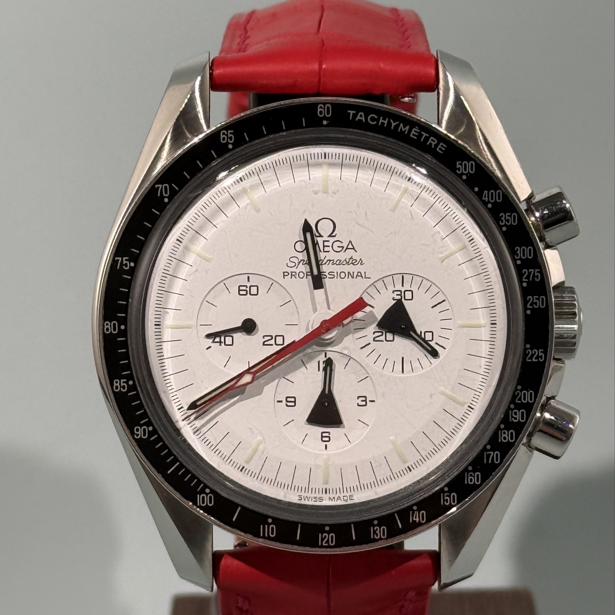 May be an image of wrist watch and text