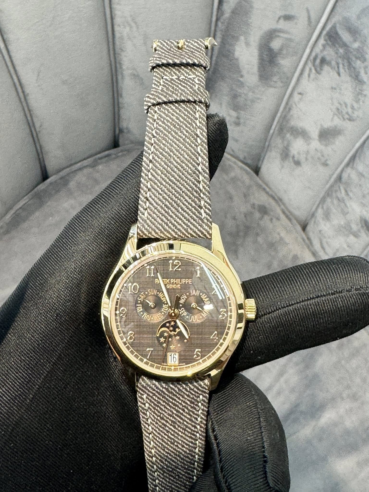 May be an image of wrist watch and text