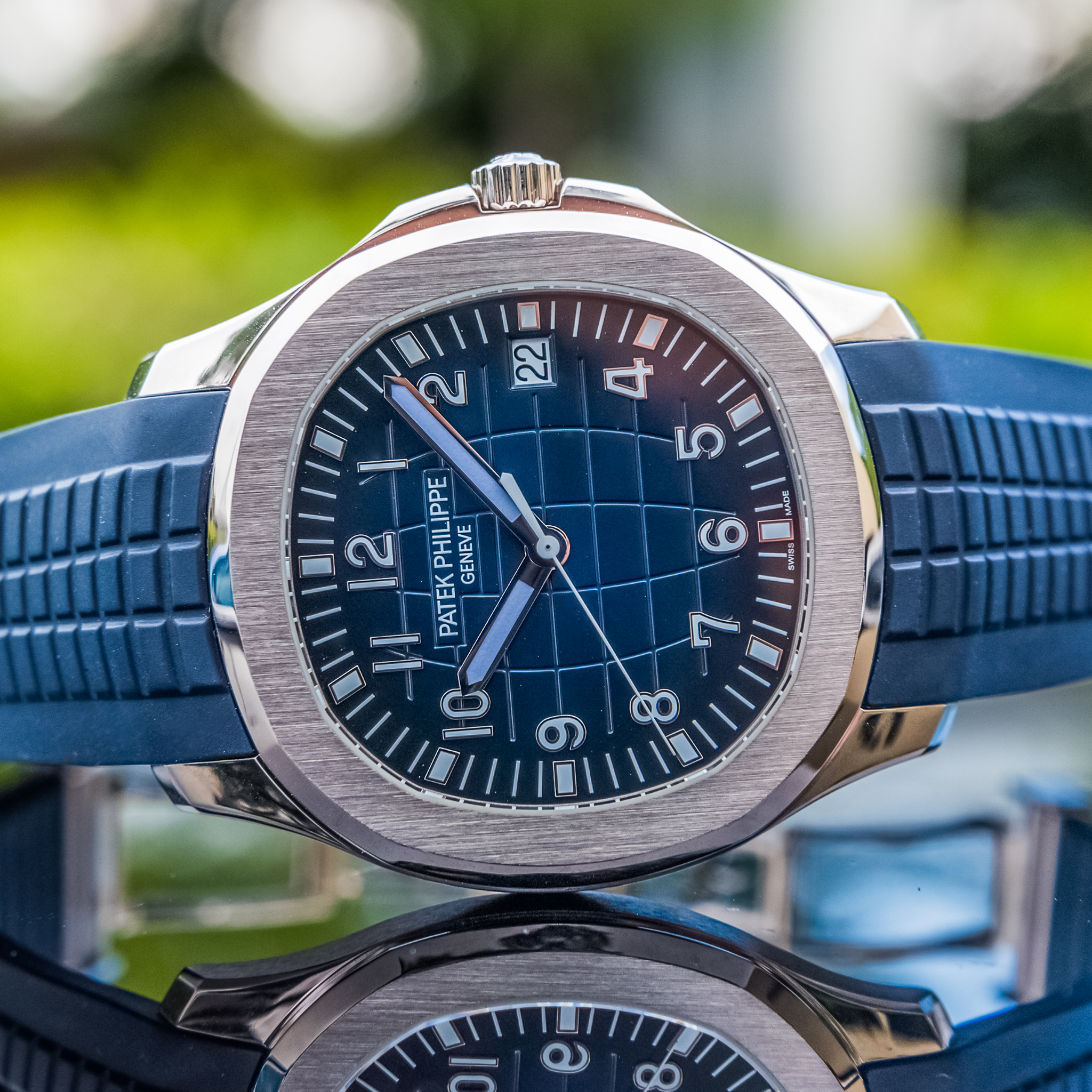 May be an image of wrist watch and text