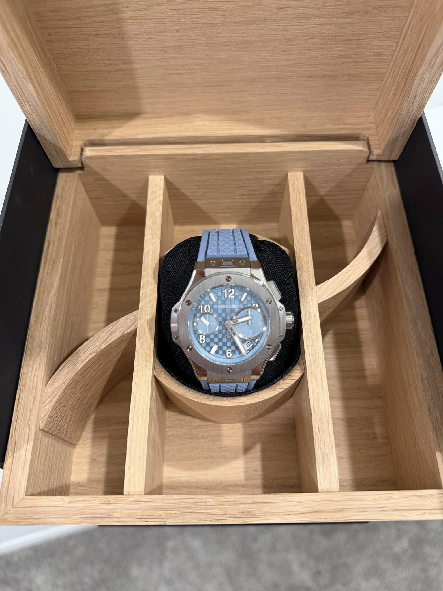 May be an image of wrist watch and text