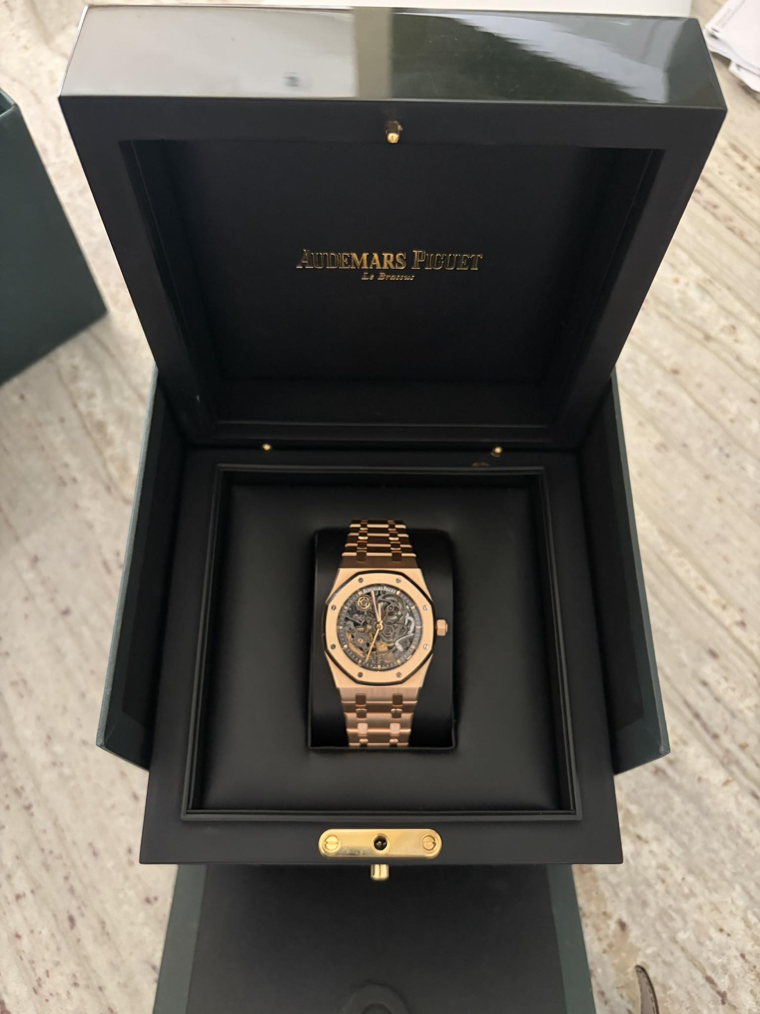 May be an image of wrist watch and text