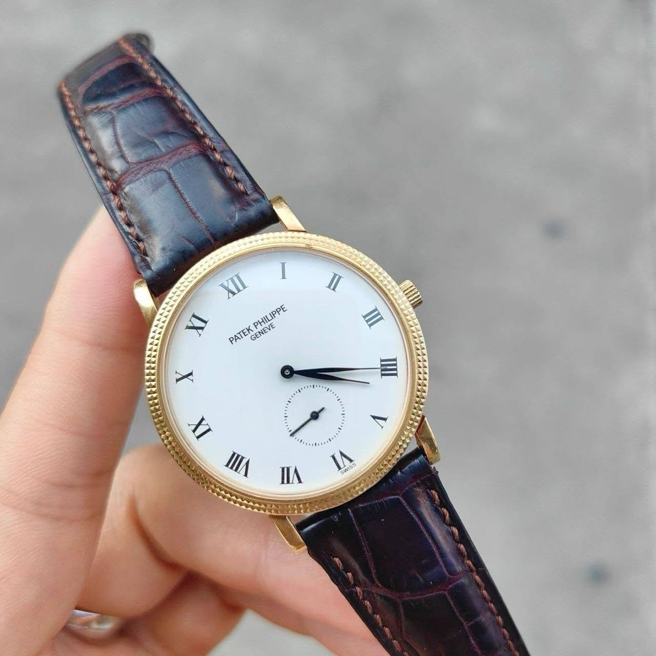 May be an image of wrist watch and text that says 'I II XII XI PHILIPPE PATEK GENEVE X IIII V Fie IX VIII IA'