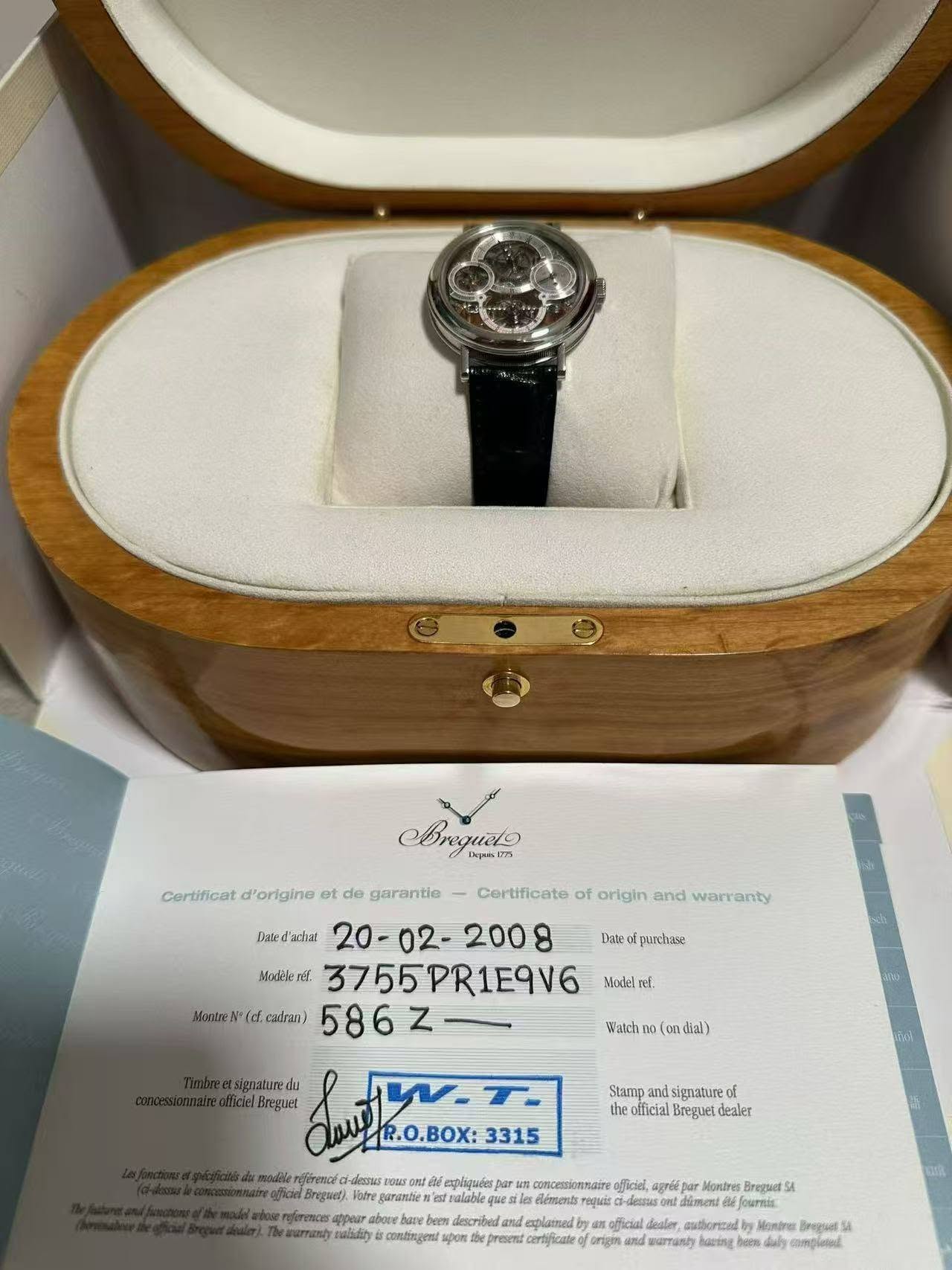 May be an image of ring, wrist watch and text