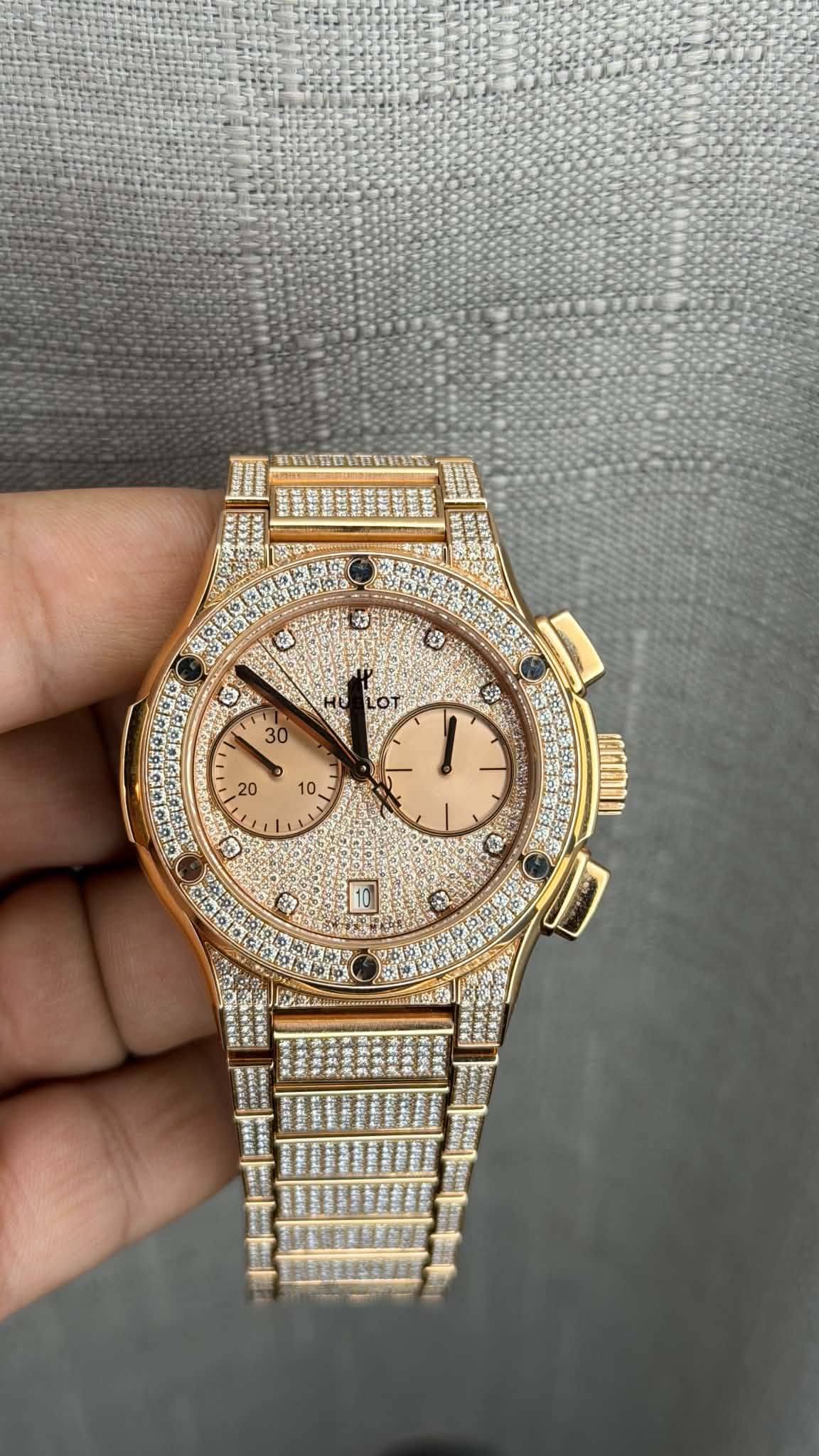 May be an image of wrist watch and text