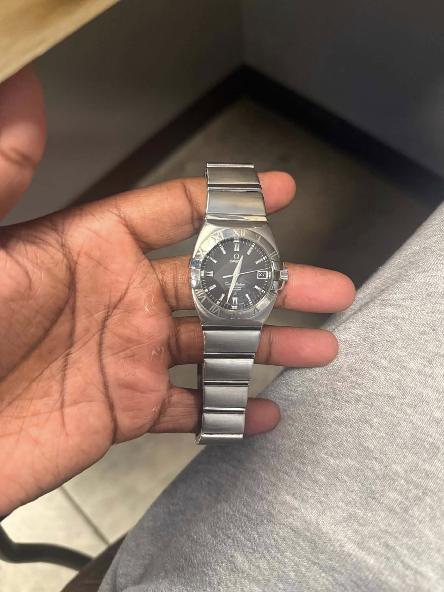 May be an image of wrist watch
