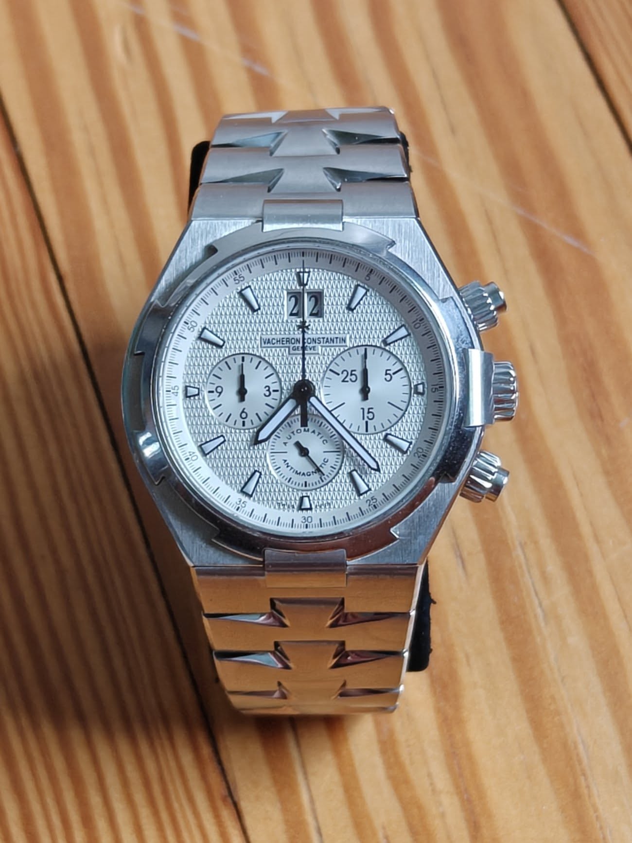 May be an image of wrist watch and text