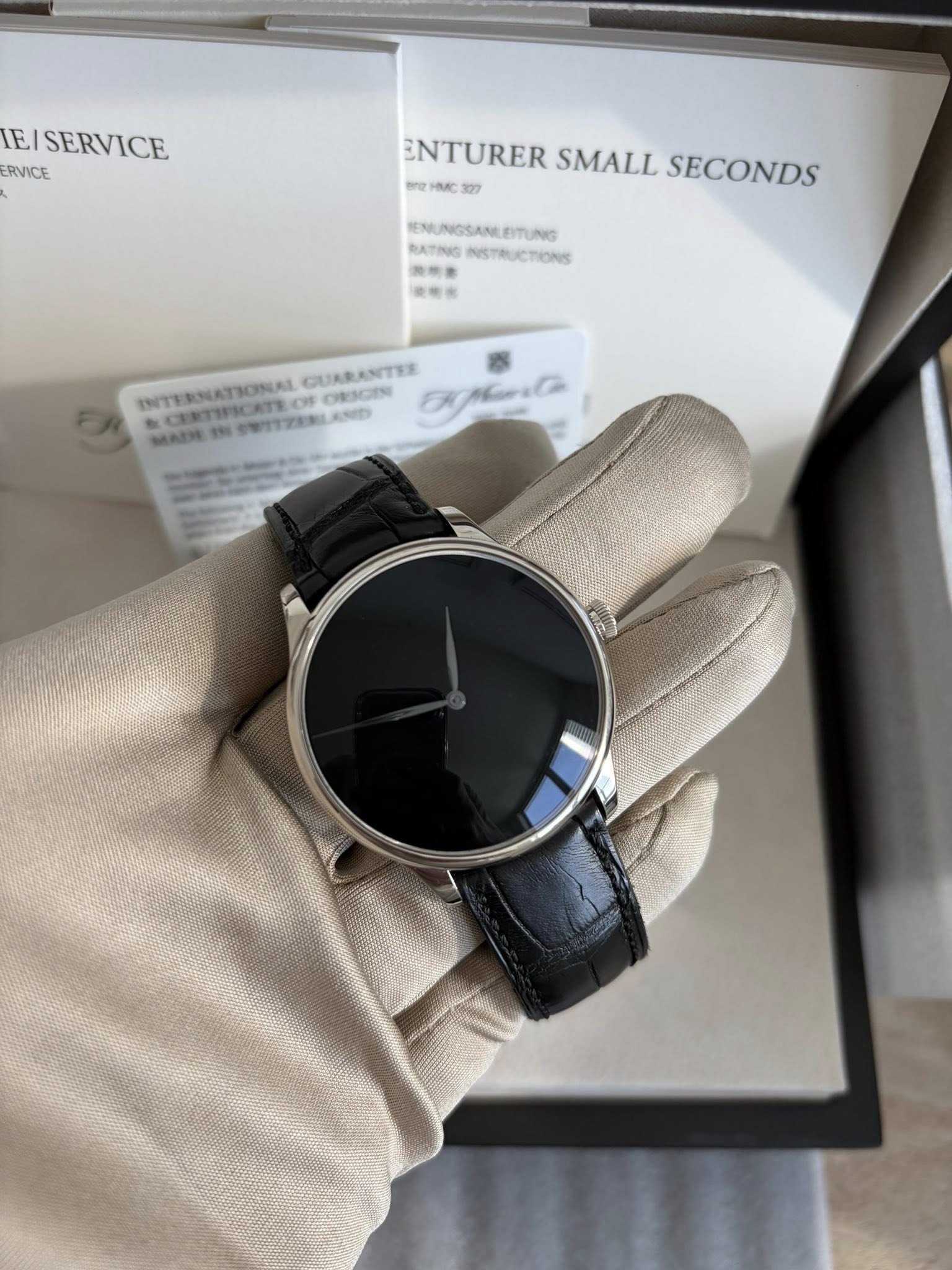 May be an image of wrist watch and text