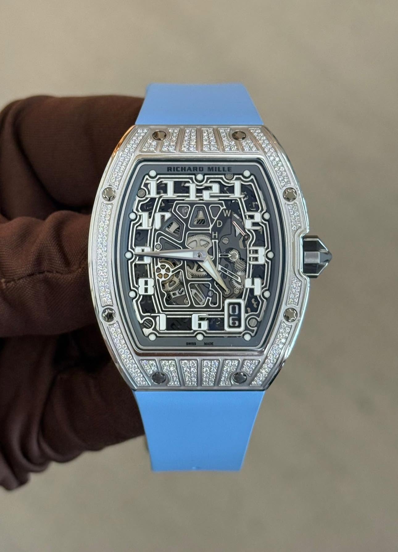 May be an image of wrist watch and text