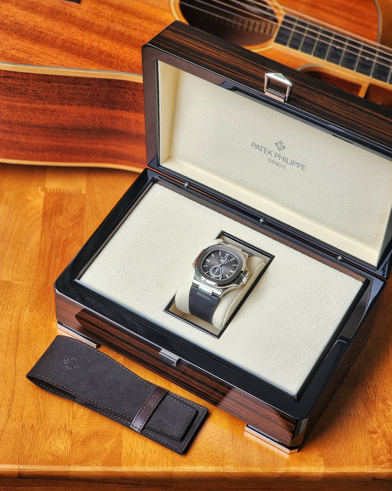 May be an image of wrist watch and text