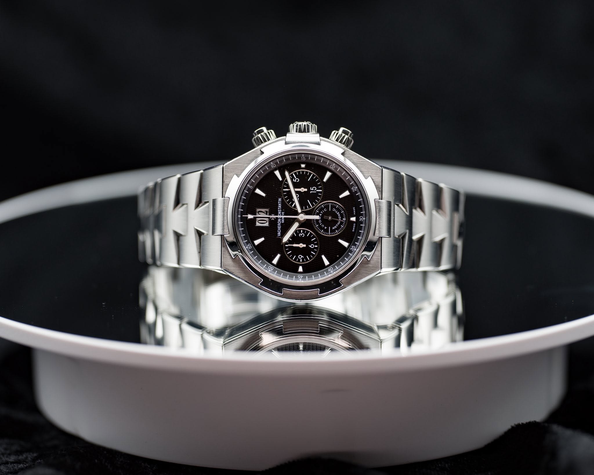 May be an image of wrist watch and text